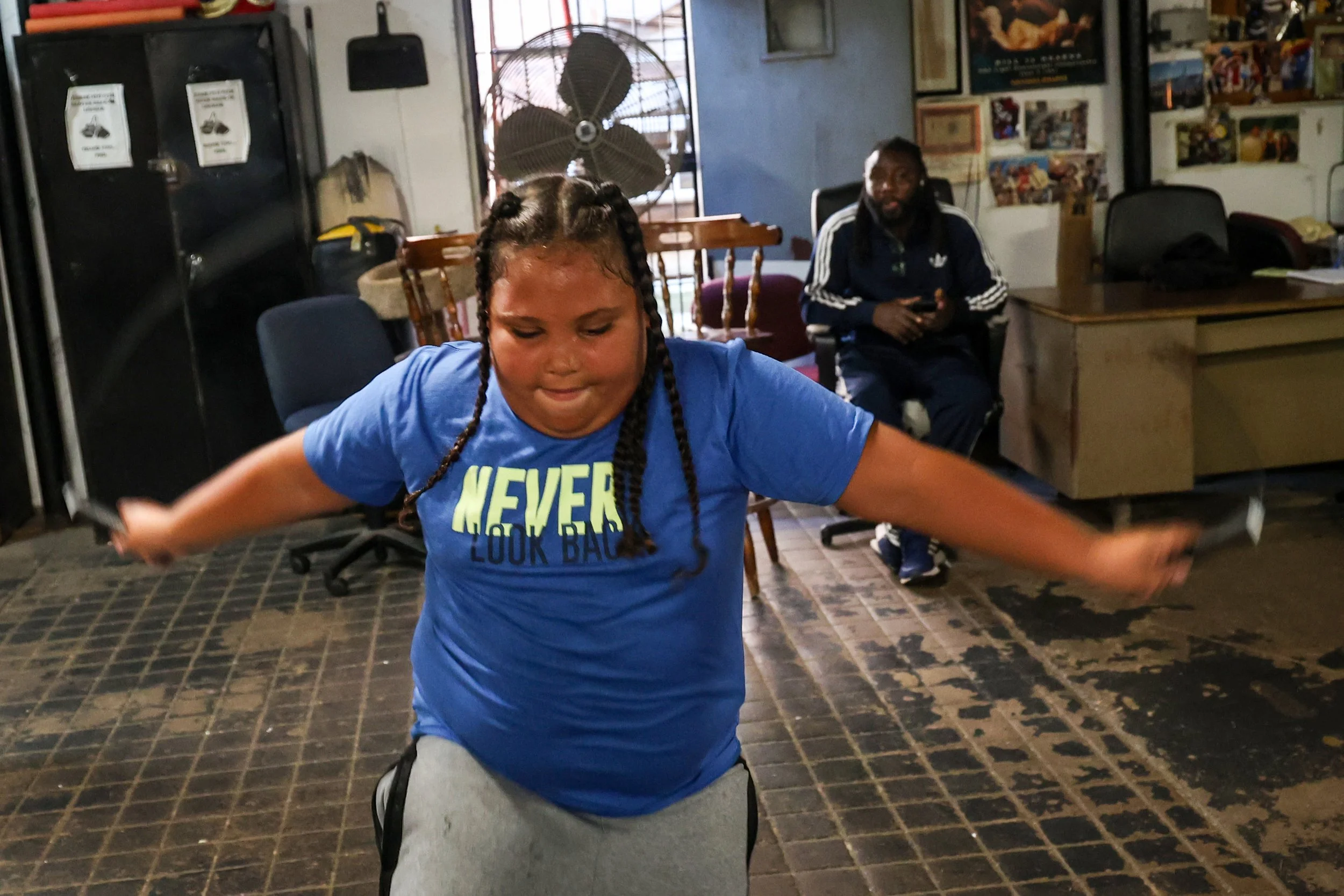 A young fighter “Adrian” (no last name given) 10, jumps rope while training at Ike and Randy's Boxing Gym. As one of only two remaining boxing gyms in Paterson, the gym offers a dedicated space for young boxers to train and master the art of boxing, 