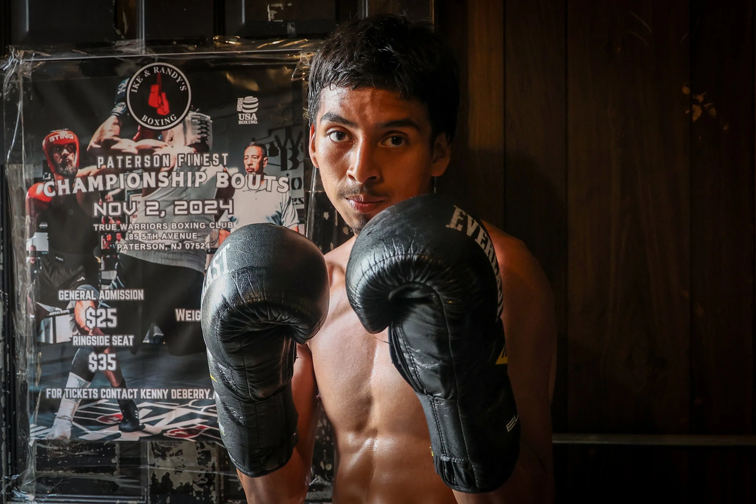 19-year-old boxer Erik Mendez, a Golden Gloves champion poses for a photo at Ike and Randy's Boxing Gym in Paterson.