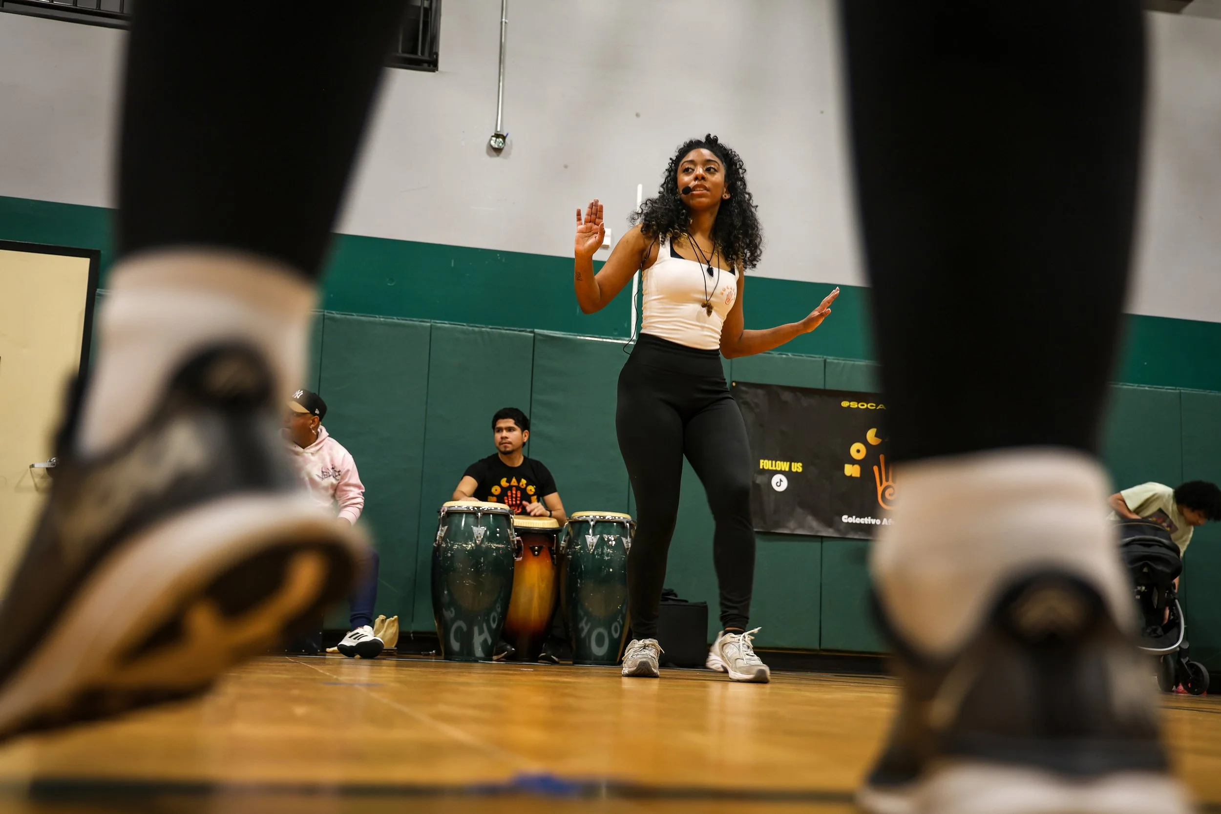 PATERSON, N.J. | 03-13-25: Dance instructor Marggie Ponce teaches Afro-Peruvian dance in the gym at the Community Charter School of Paterson. The class is hosted by Socabón Peru, a collective dedicated to promoting, educating, and celebrating Afro-Pe