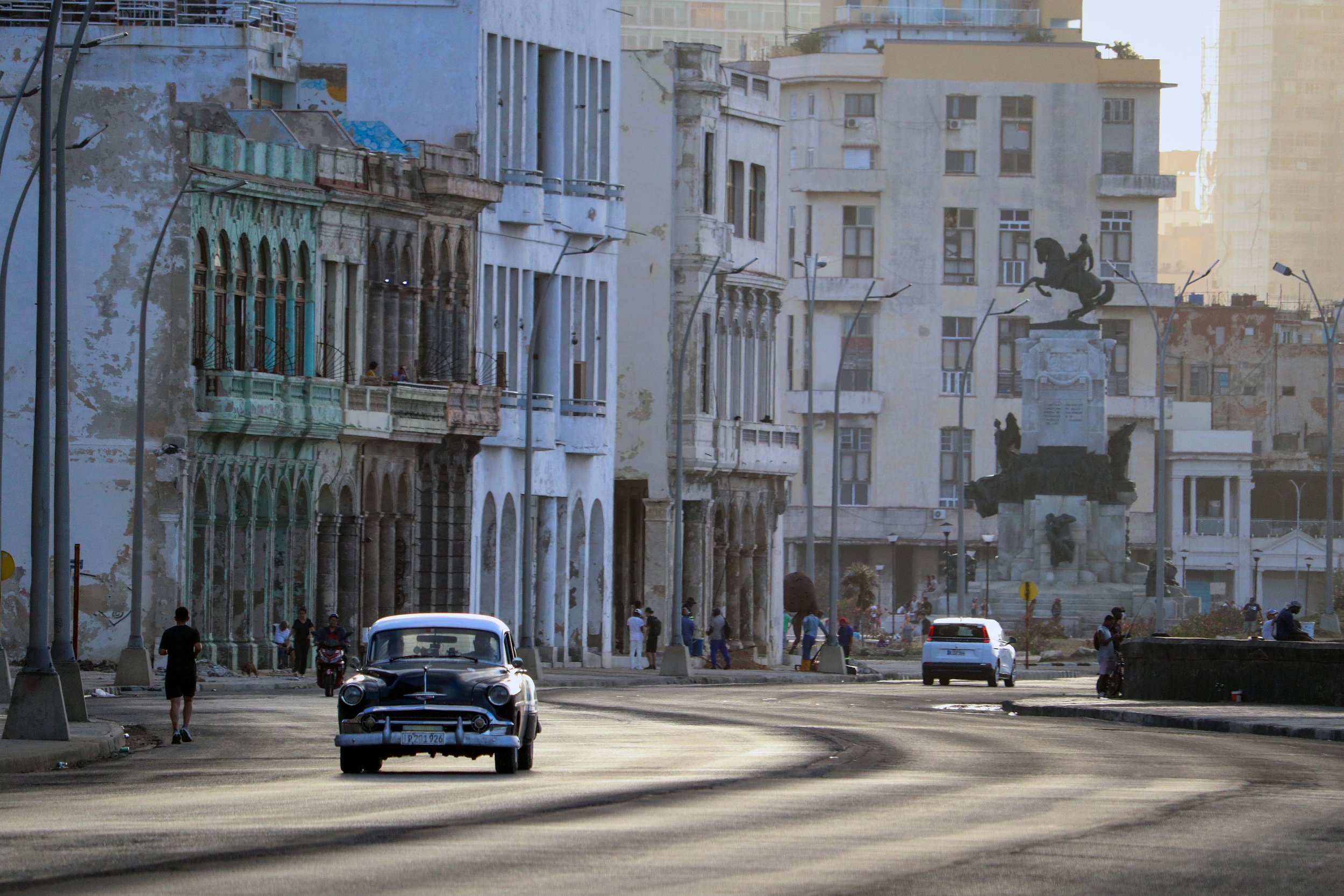 HAVANA, CUBA — March 9, 2026: A single classic American car travels along the Malecón (Malecón de La Habana). Ongoing fuel shortages have left far fewer cars on the streets, especially older, gas-hungry vehicles that have long been an iconic symbol o