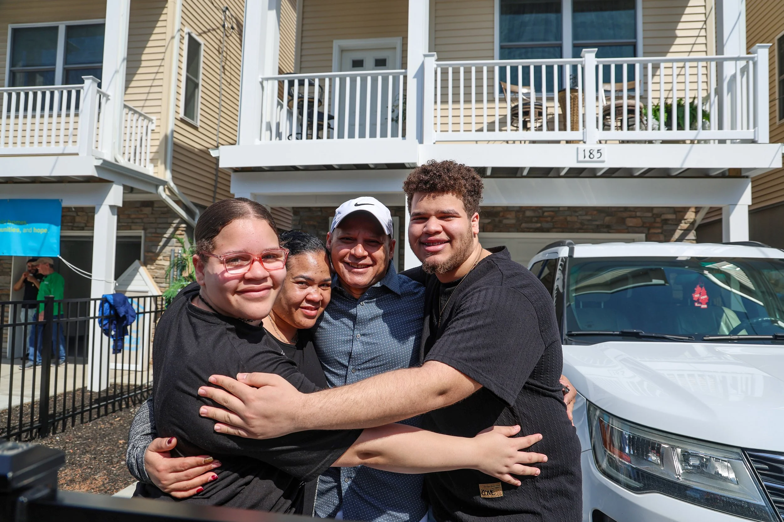 PATERSON, N.J. | March 29, 2025 — The Serrano family was one of eight Paterson families to achieve homeownership through Passaic County Habitat for Humanity. The newly built homes on Harrison Street are helping revitalize a neighborhood once marked b