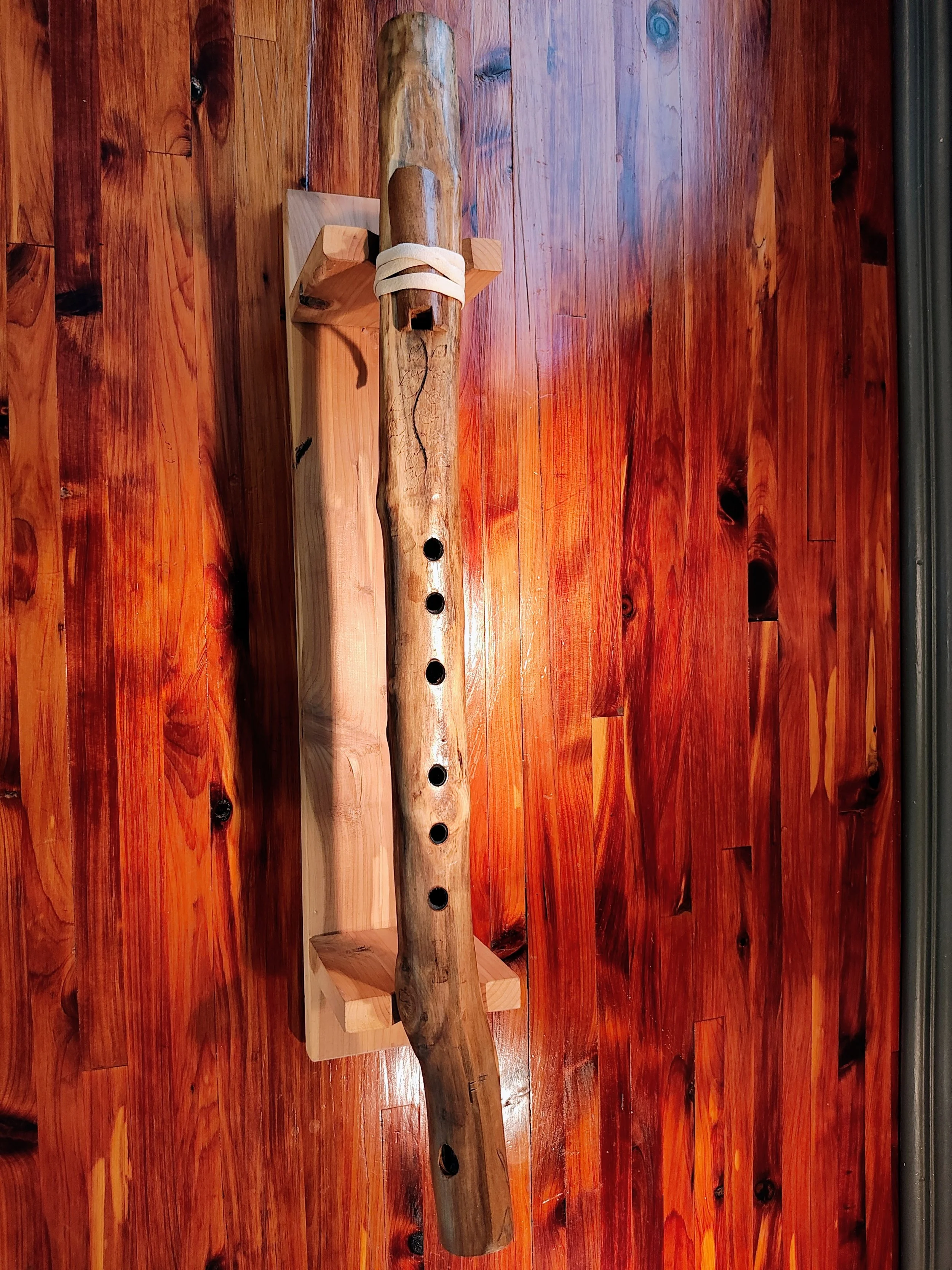 A wooden natural branch native american style flute 