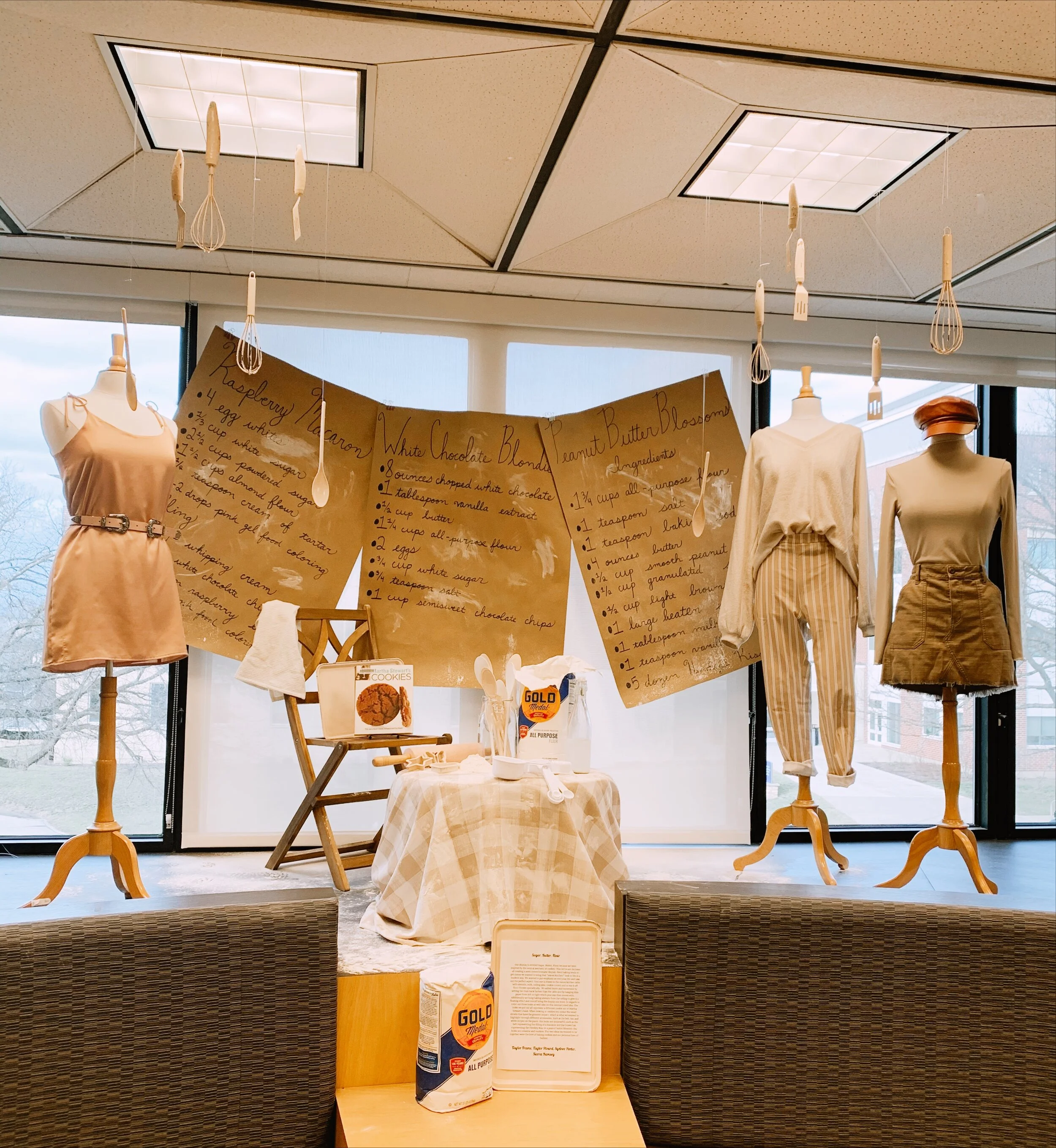 Visual Merchanding Class: The task was to create a visual "window" display based on a cookbook. The group chose three looks inspired by cookie recipes. 
