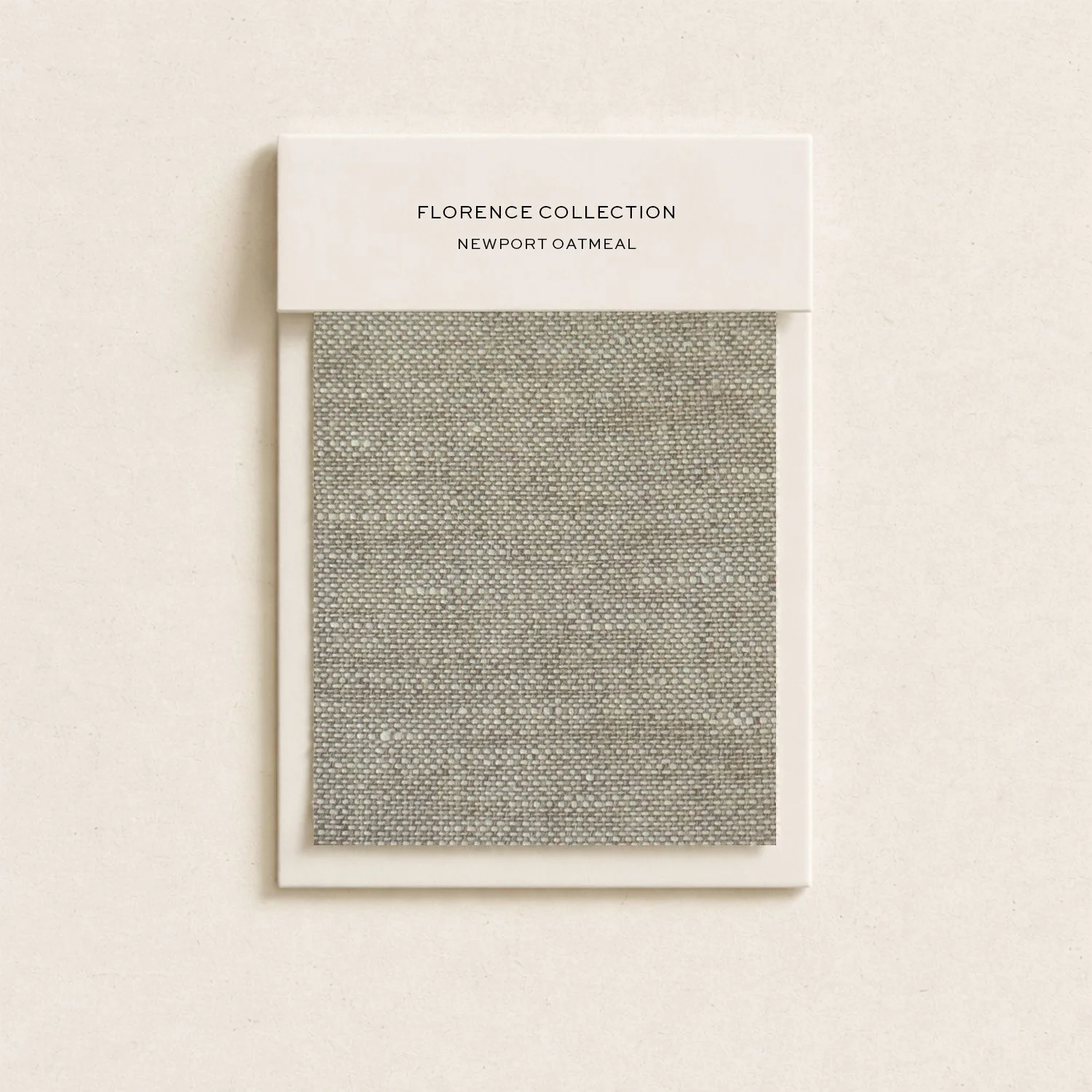 Color swatch sample from the Florence Collection called Newport Oatmeal, featuring a woven textured fabric in shades of beige and gray.