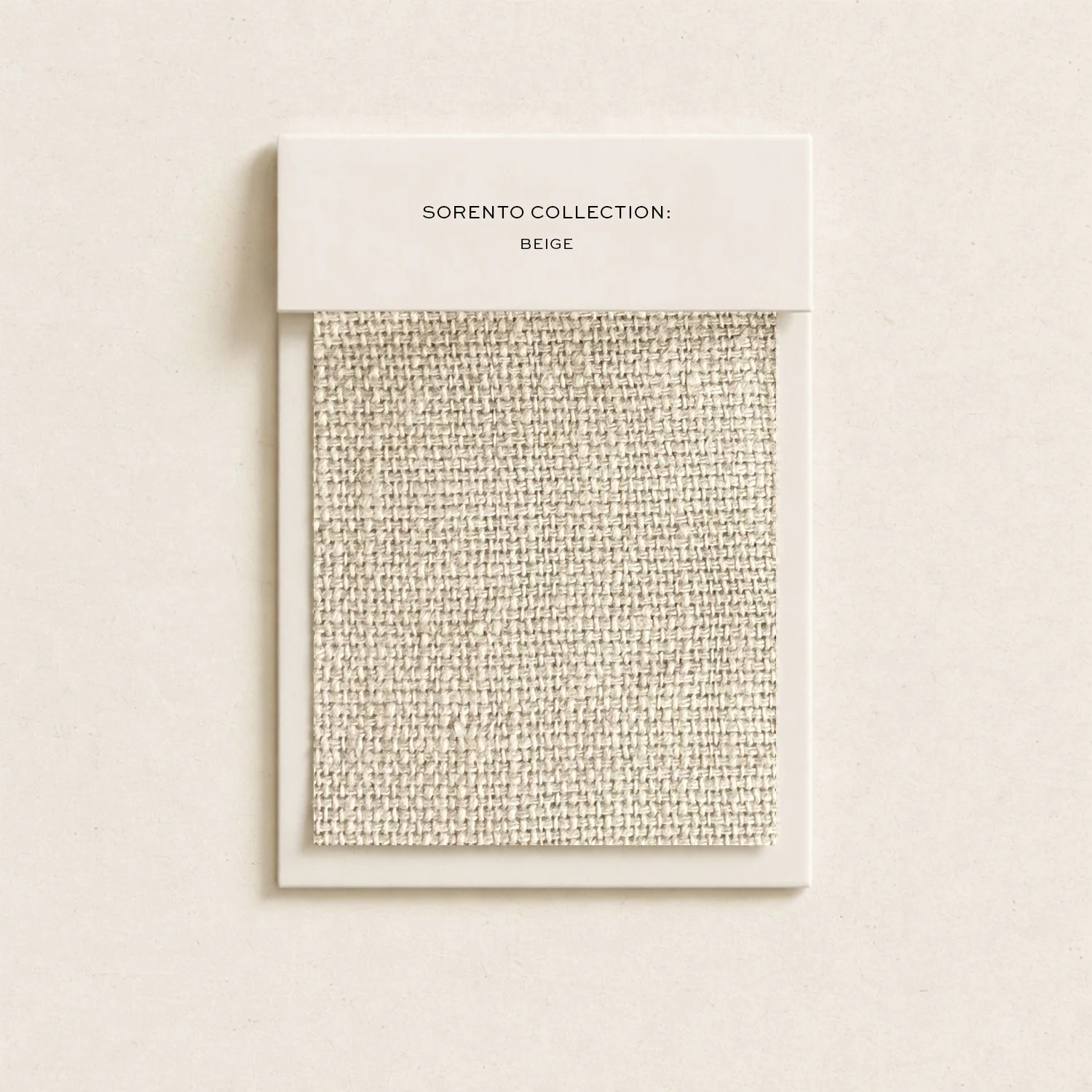 A sample swatch of beige fabric in a display card labeled 'Sorento Collection: Beige' on a plain white background.