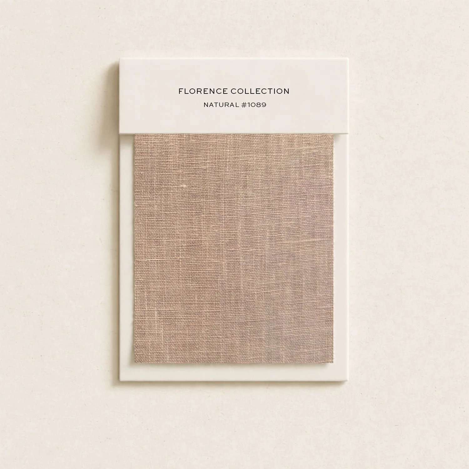 Fabric sample swatch for Florence Collection, natural color, hanging on a white display board against a light background.