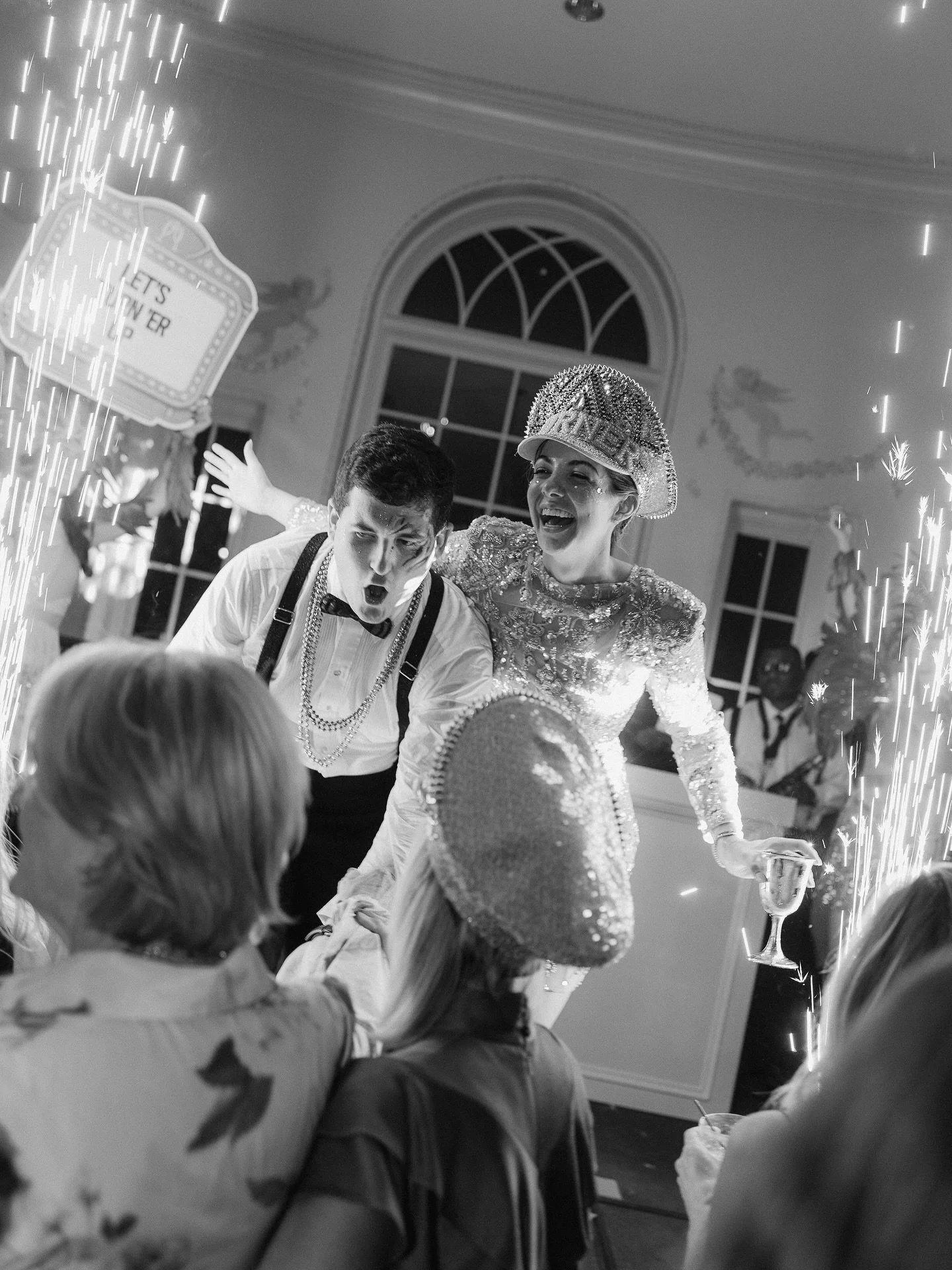 Sparks flying &mdash; literally ✨ From her sparkly reception look to the sparks lighting up the dance floor, this night was pure magic with Grace and John!