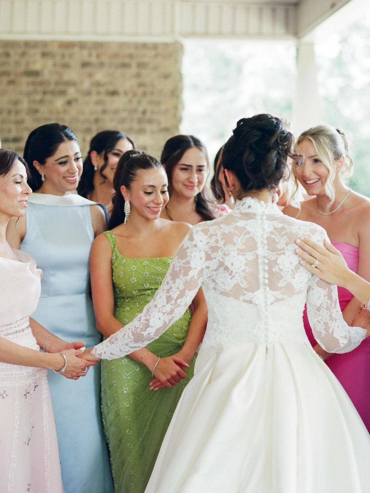 There&rsquo;s nothing quite like seeing your closest friends&rsquo; reactions during a first look. Ohtra&rsquo;s bridesmaids were so full of love and support, and their pastel dresses perfectly complemented her stunning white gown.