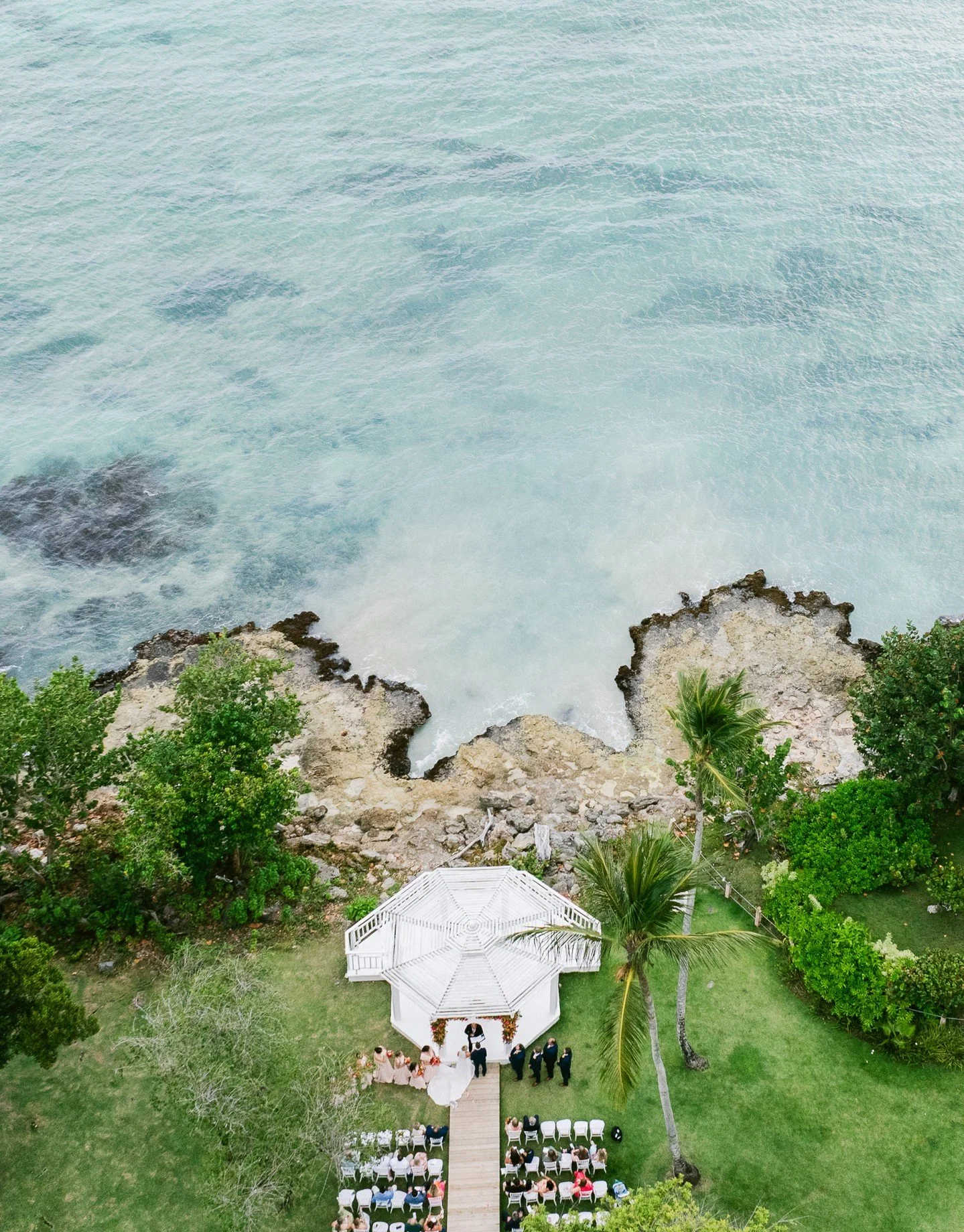 I had the honor of capturing a stunning oceanside ceremony that truly felt like a fairy tale. The gentle surf mingled with heartfelt vows, communion, and an incredible message during the ceremony created a memorable experience for all those in attend