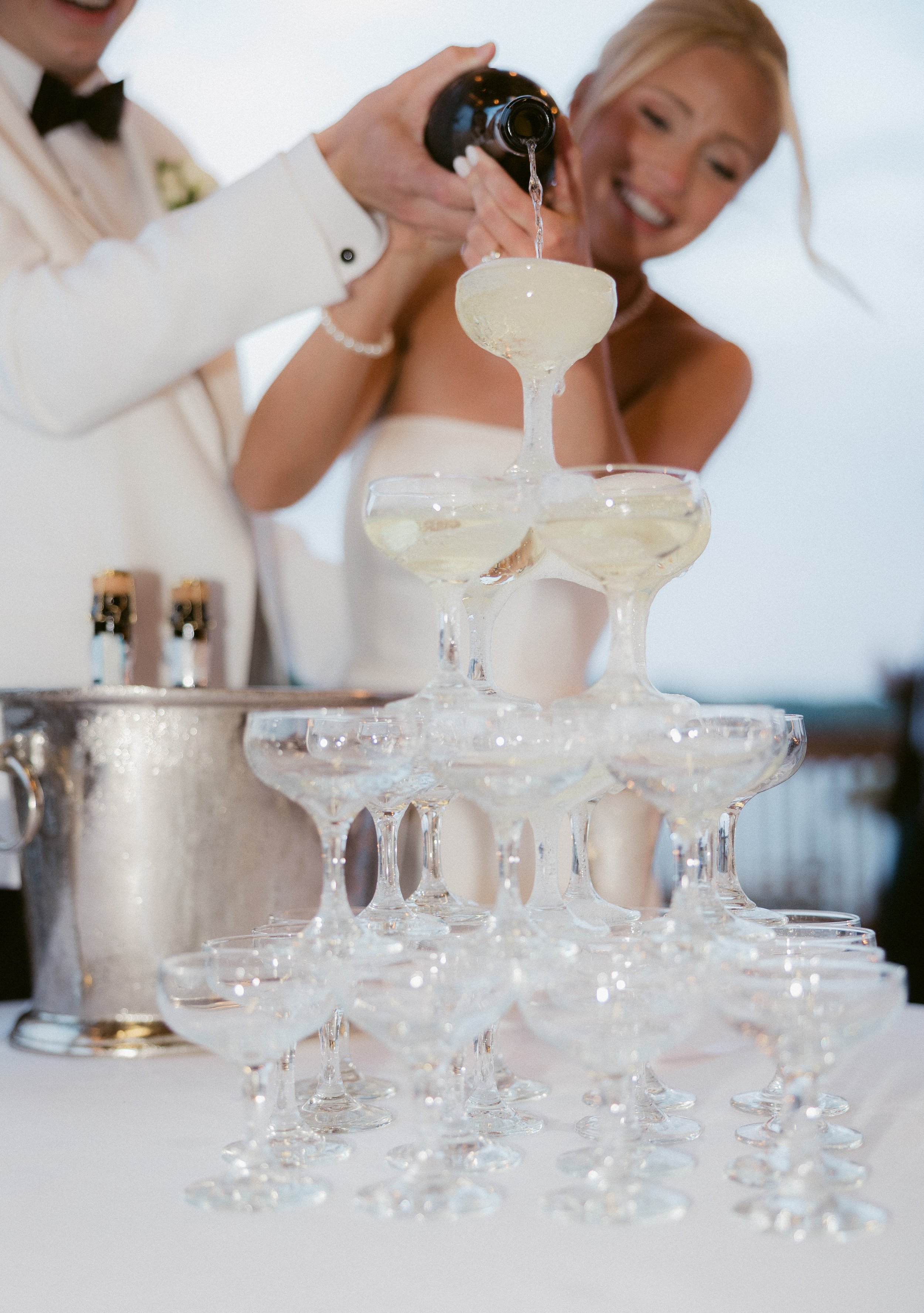 champagne tower wedding photo