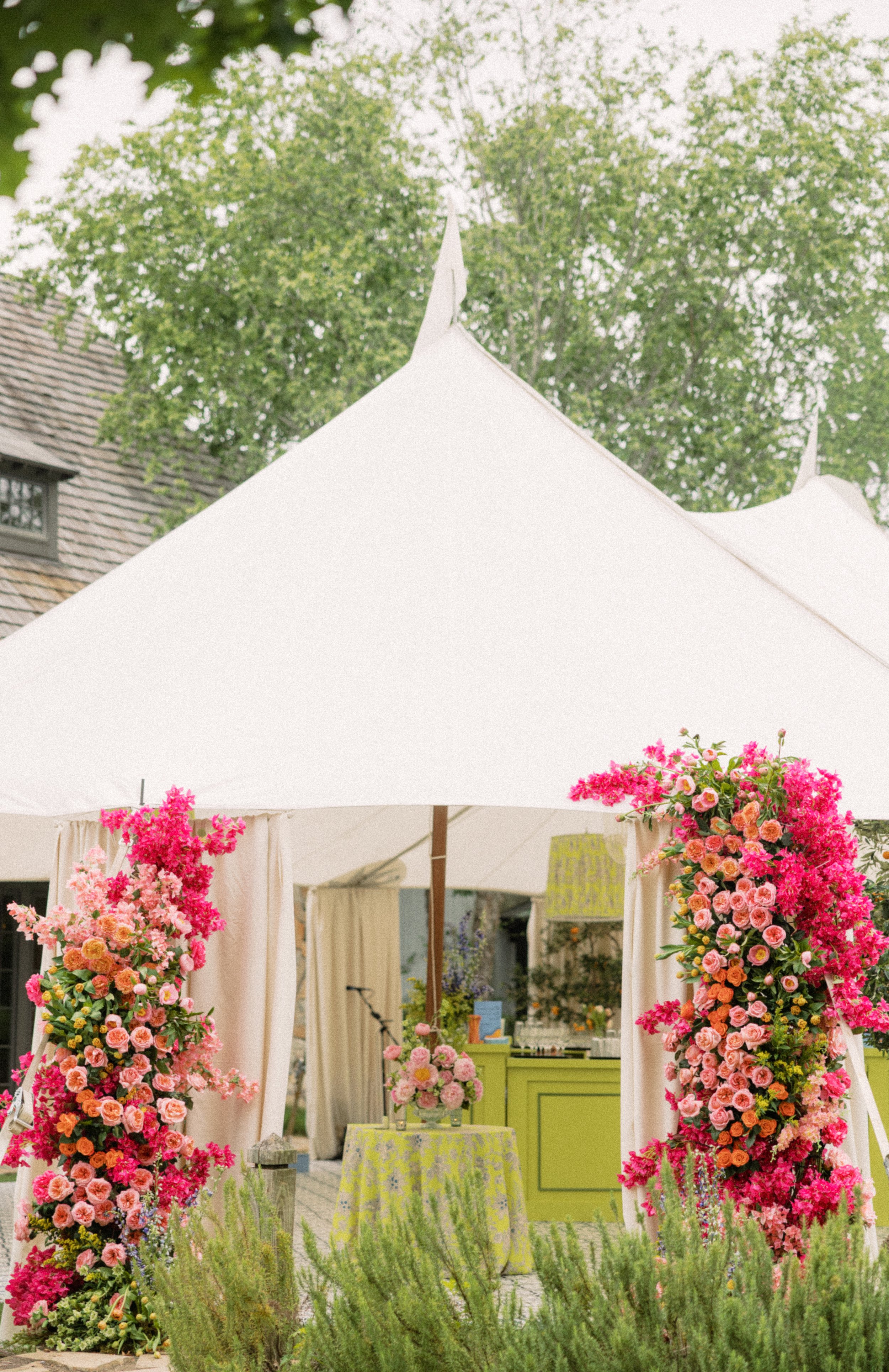 Bright floral entrance to a sailcloth tent