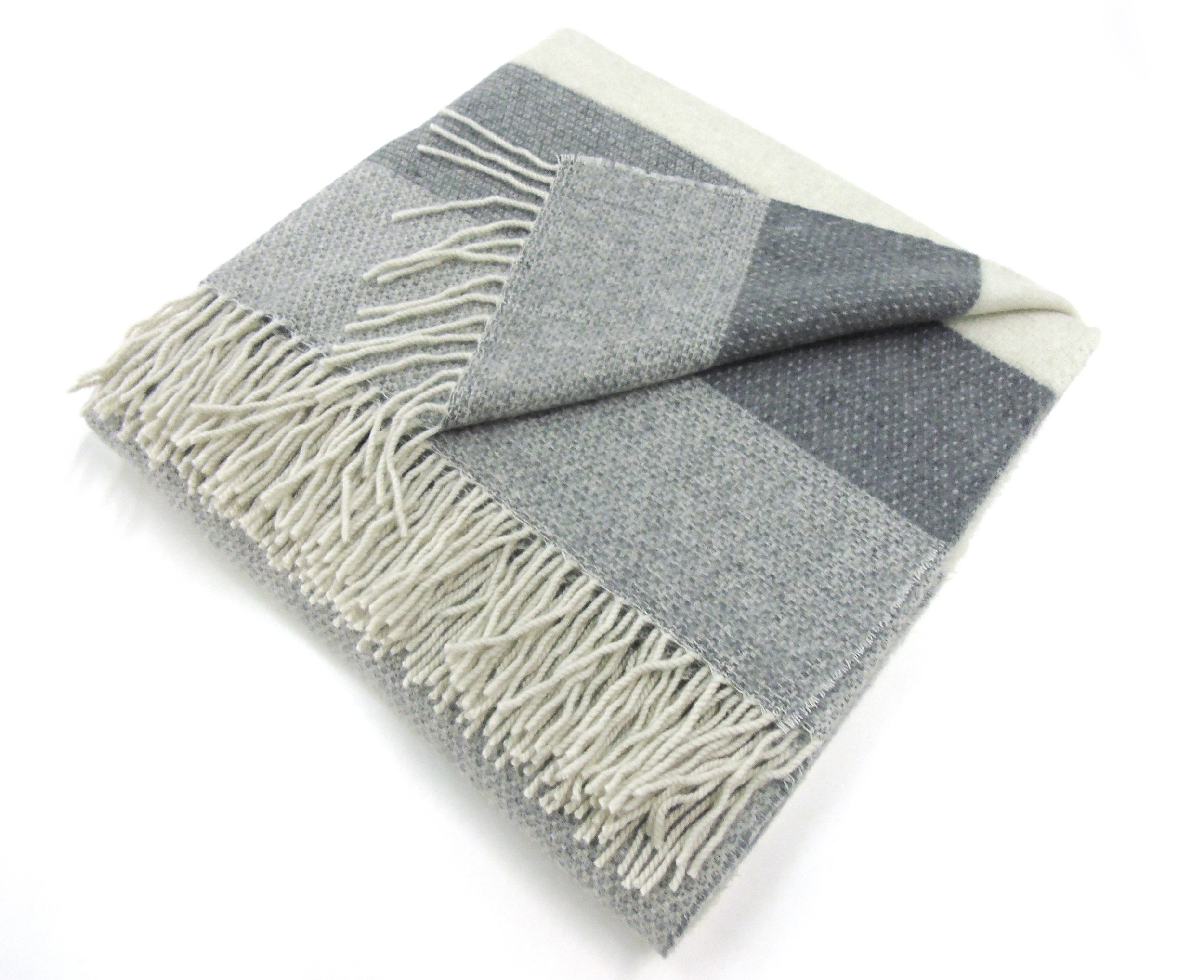 STRIPE CASHMERE THROW: 100% Cashmere in a soft textured stripe pattern with fringed edge. Size: 140x180cm. Colour: Grey.