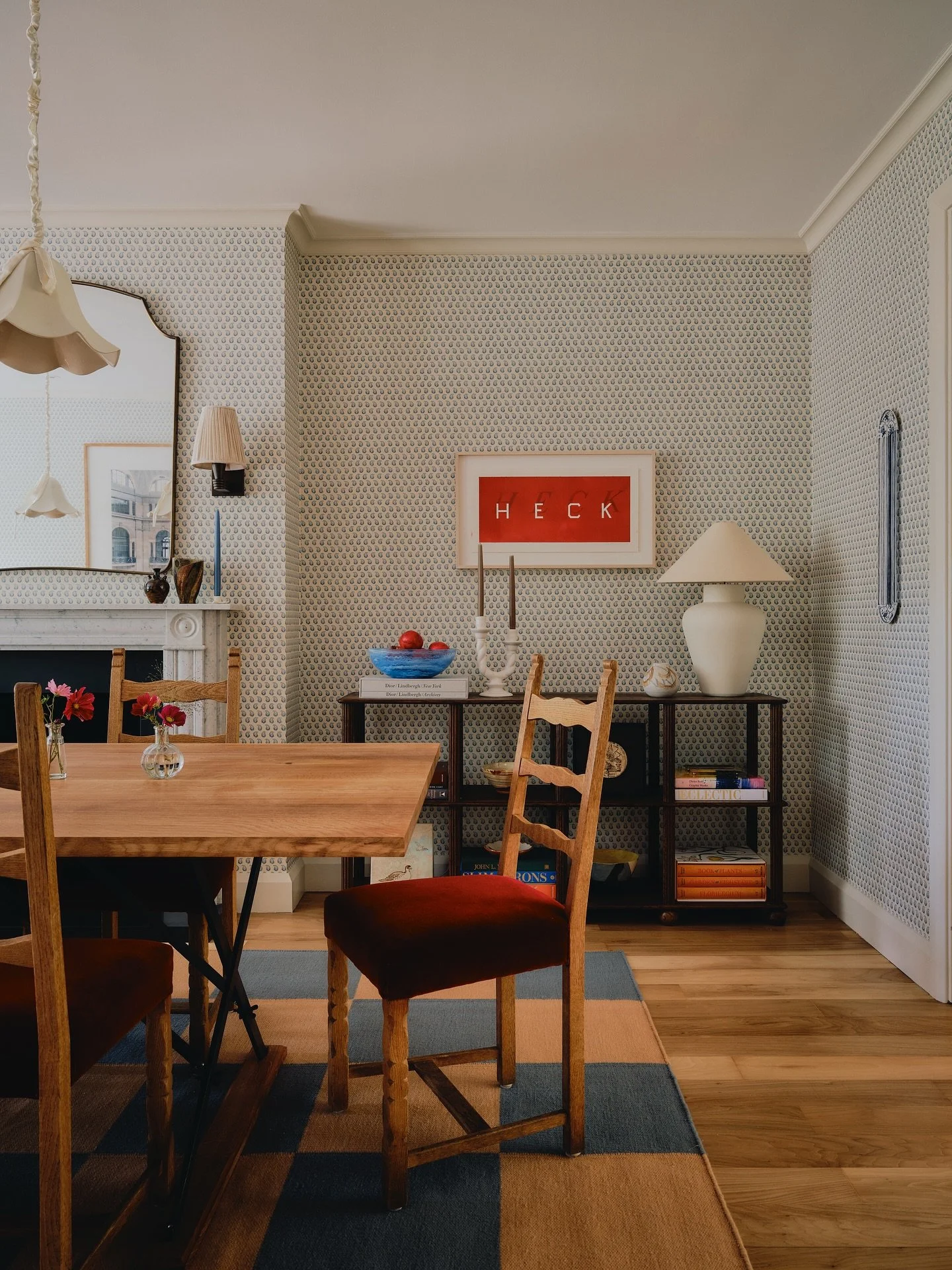 In the dining room at my recent Chelsea project, which links through to the main reception room, we took off some double doors which were dividing the spaces to make it more open but I wanted to ensure I gave each space their own identity. We opted f