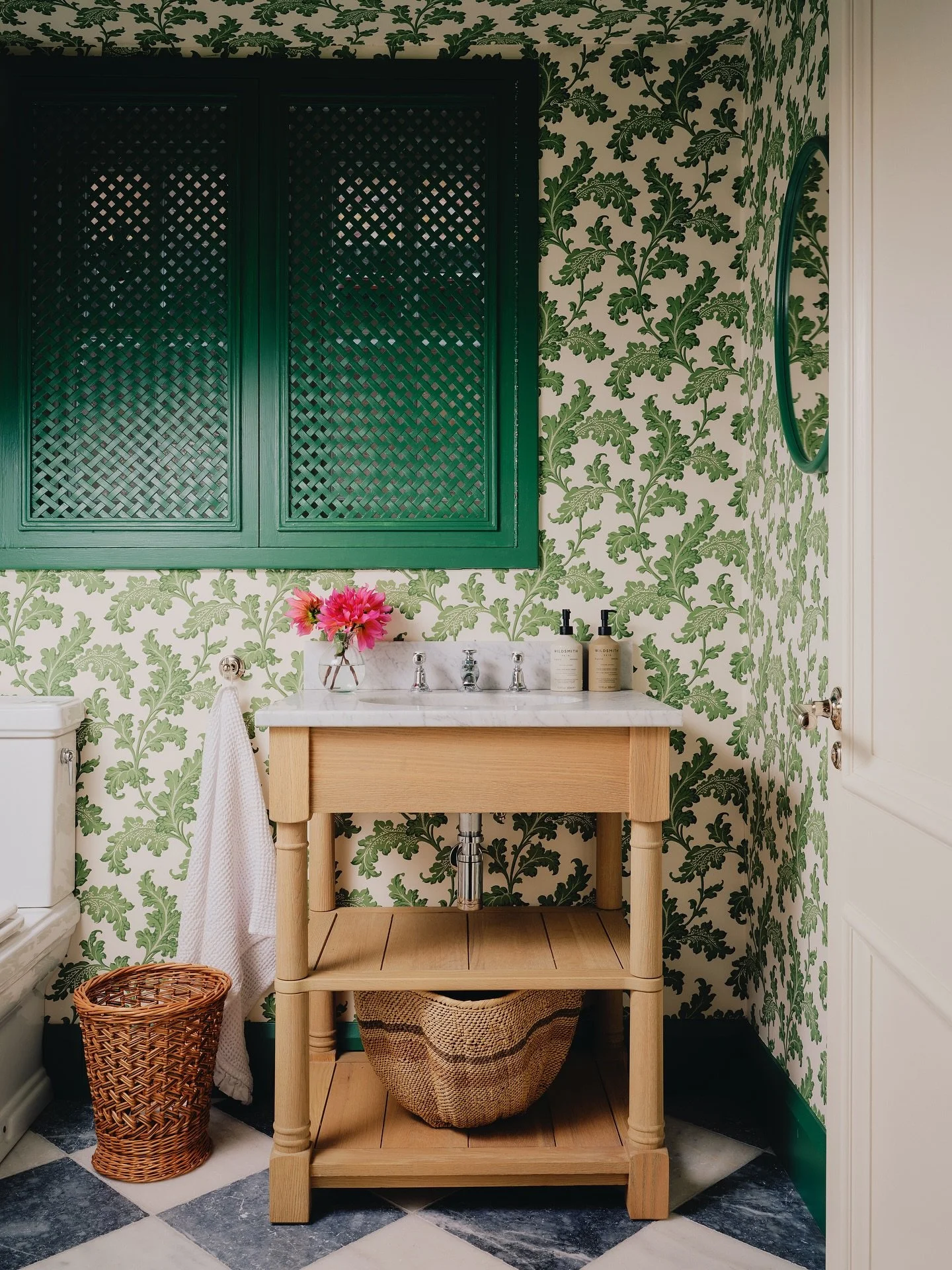 A sweet little downstairs loo in Chelsea. We wrapped the walls &amp; ceiling of this small space in this wonderful Scrolling Acanthus wallpaper by @soanebritain, ran the marble checkerboard floor in from the hallway, and painted existing shutters &am
