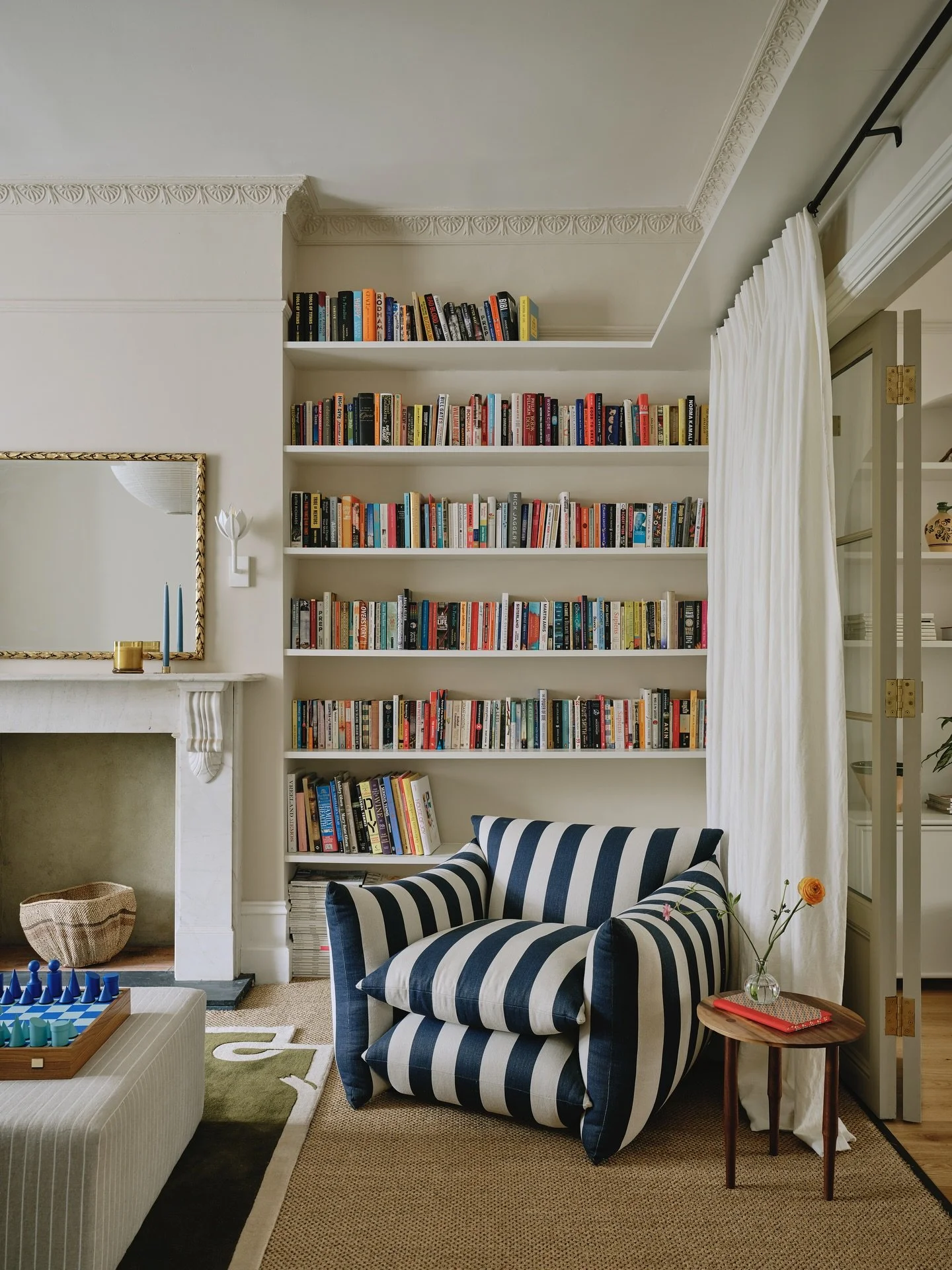 Two interconnecting spaces in my Acton project, for grown ups and kids alike, whilst staying relatively multipurpose and informal. The first image shows the glazed joinery doors we added between the two spaces to enable a divide when needed, with a c