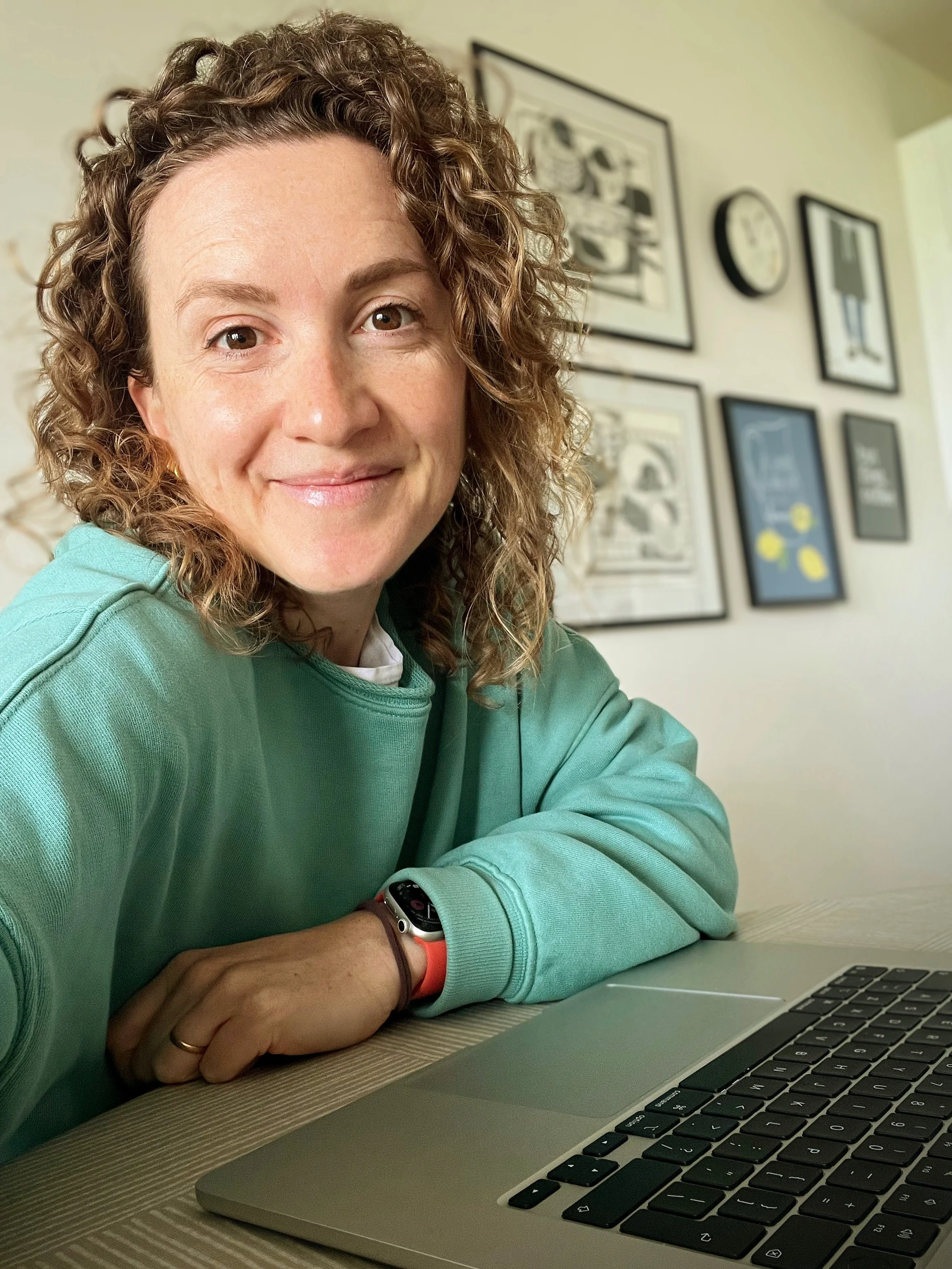 Author Emily Koch at her laptop