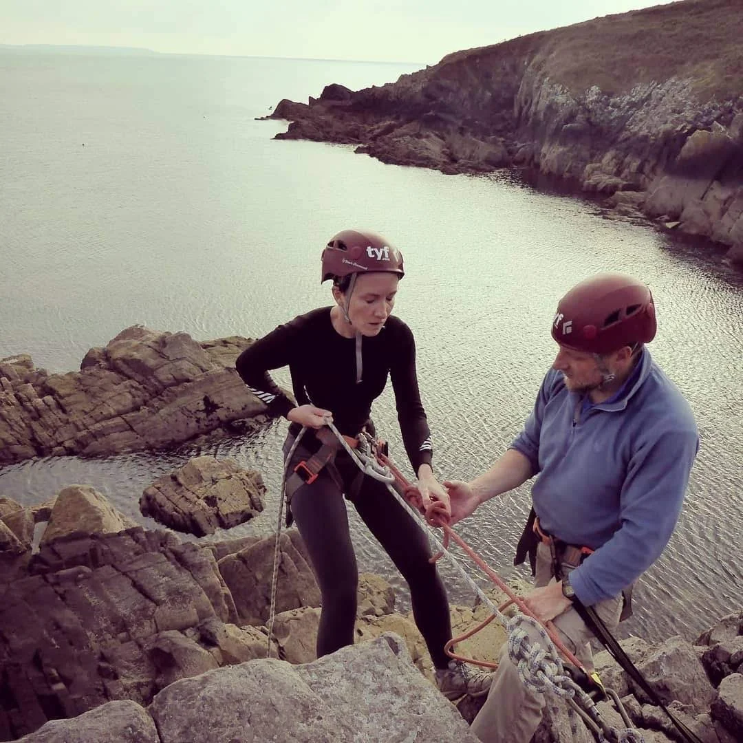 Looking at this photo makes me feel a little nauseous. It was taken a lot of years ago when I was writing IF I DIE BEFORE I WAKE and researching the climbing sections of the book. I learned to boulder and also did this abseil session in Pembrokeshire