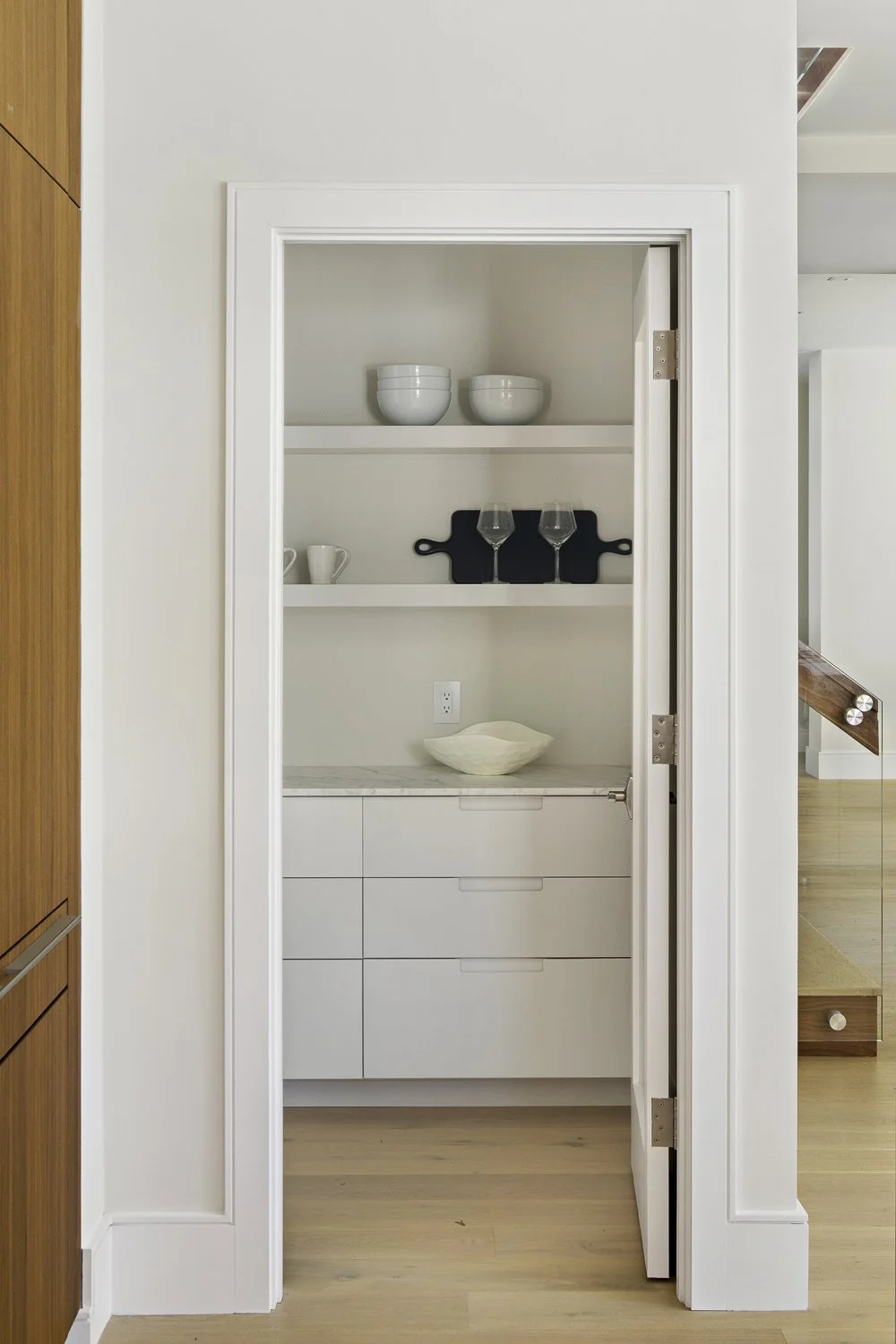 The kitchen shot showing clean cabinetry and countertops