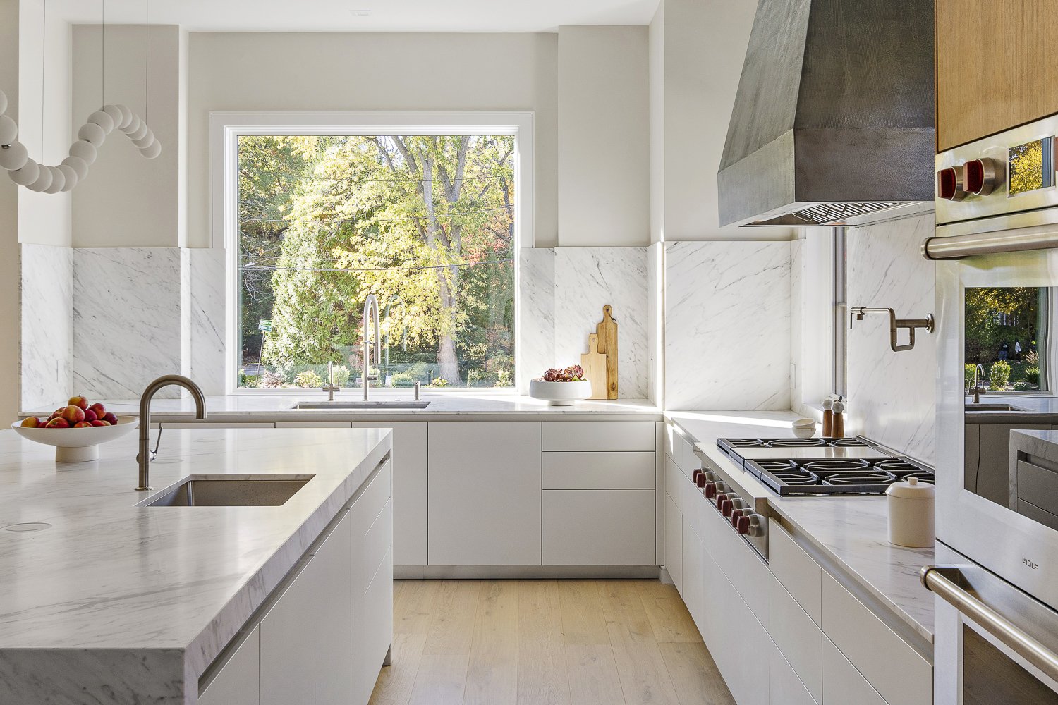 The kitchen shot showing clean cabinetry and countertops