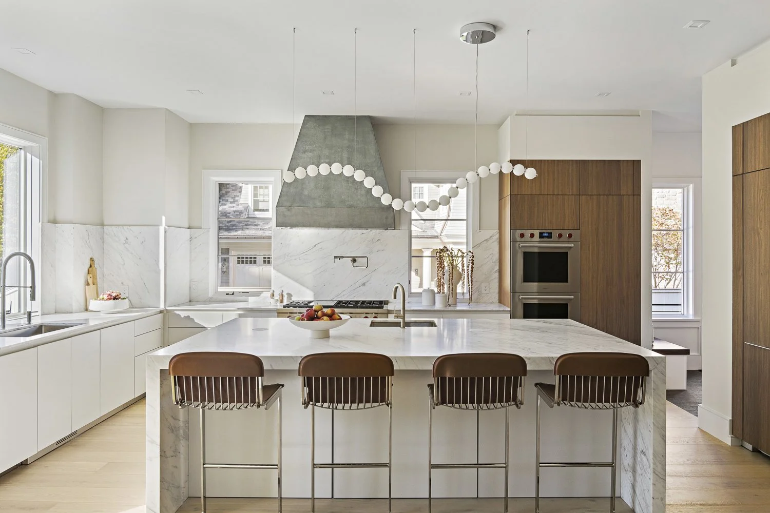The kitchen shot showing clean cabinetry and countertops