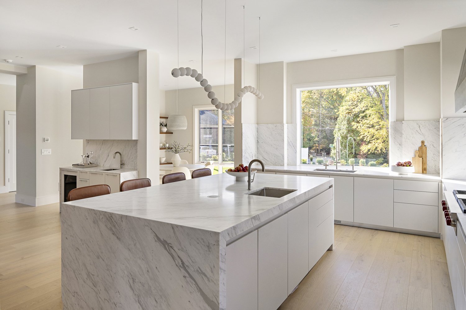 The kitchen shot showing clean cabinetry and countertops