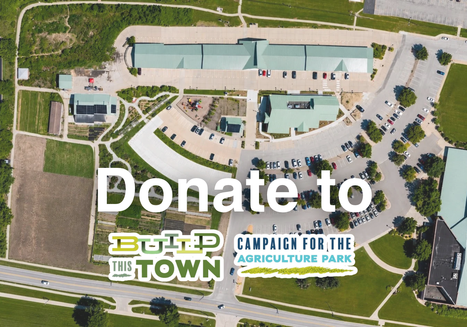 Text reads "Donate to Build this Town: Campaign for the Agriculture Park" with clickable image featuring a of Columbia's Agriculture Park featuring the Columbia Farmers Market Pavilion, Columbia Center for Urban Agriculture's production rows, Welcome
