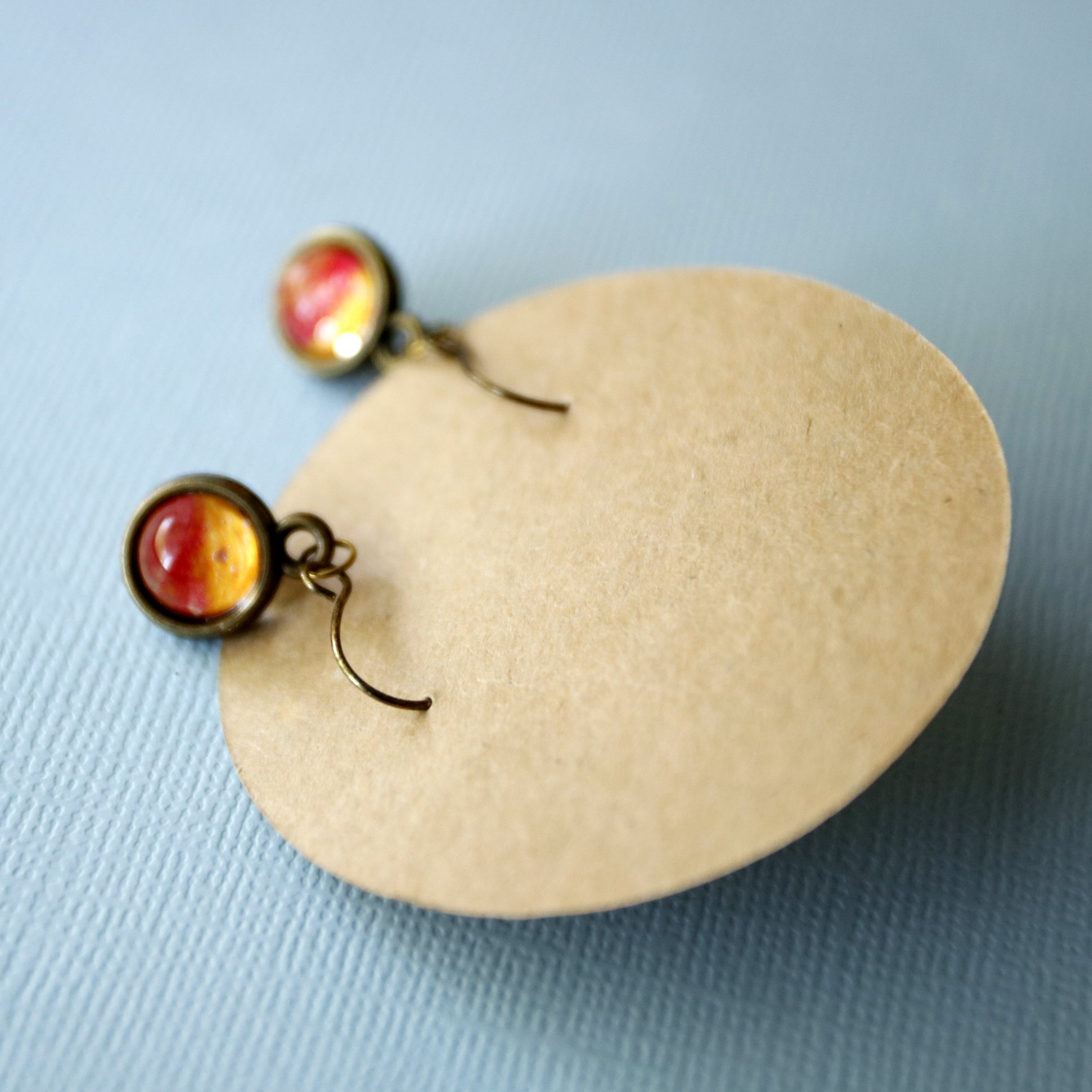 dangly globe earrings