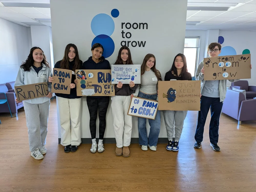 Junior Ambassadors with Marathon Signs.jpeg