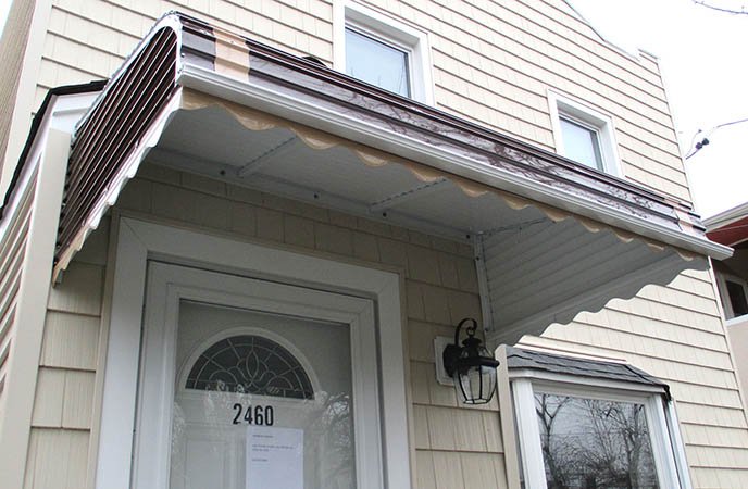 fixed-aluminum-door-awnings-perform-just-as-well-in-the-winter..jpg