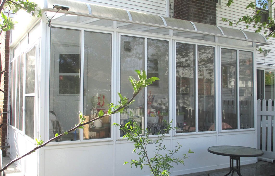 Enhance the appearance of your home with three season sunroom.JPG