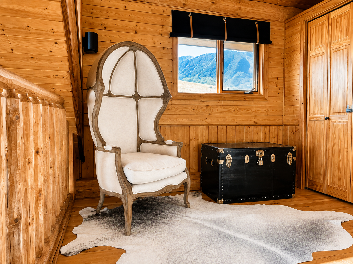 Reading chair and cowhide rug in the cabin loft