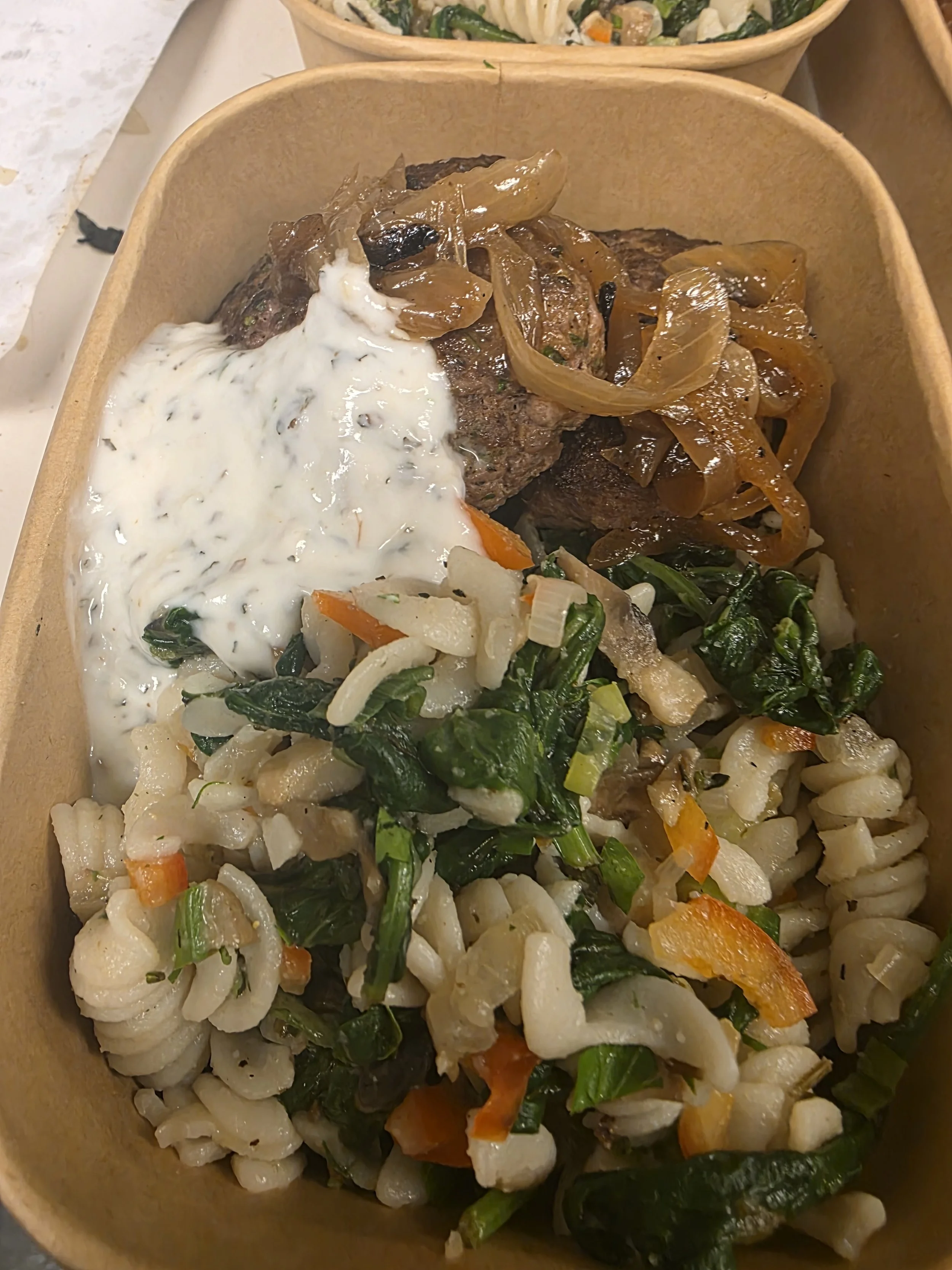 Mediterranean Lamb Patties Served with caramelized onions, brown rice pasta, vegetables, and lemon herb yogurt..jpg