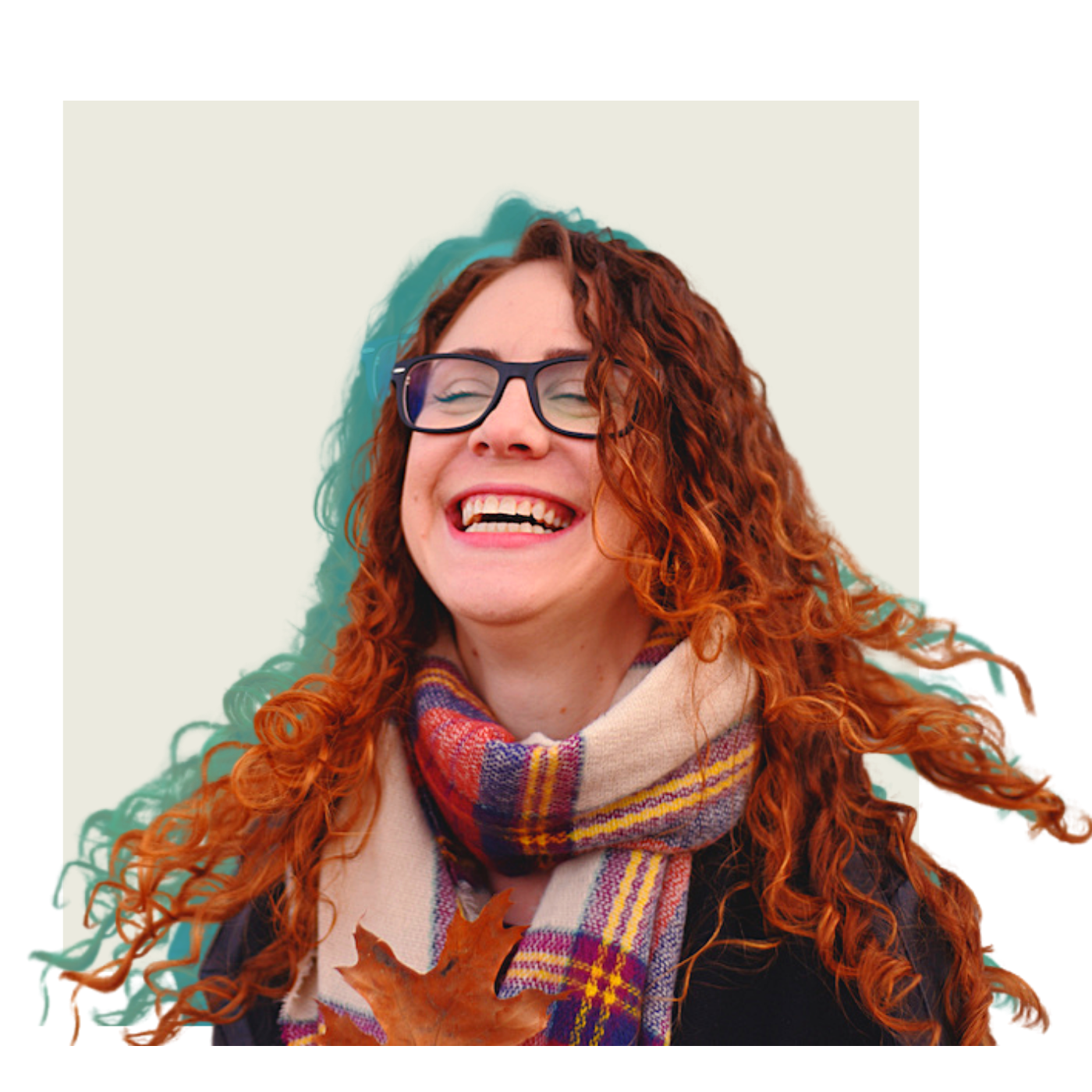 Woman in glasses smiling with her eyes closed and head tilted up