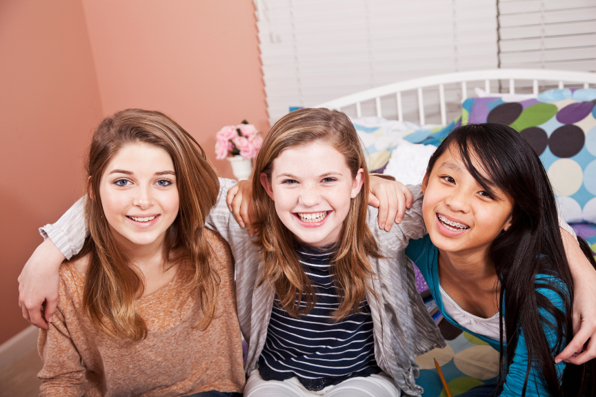 Children smiling after progress in therapy for OCD
