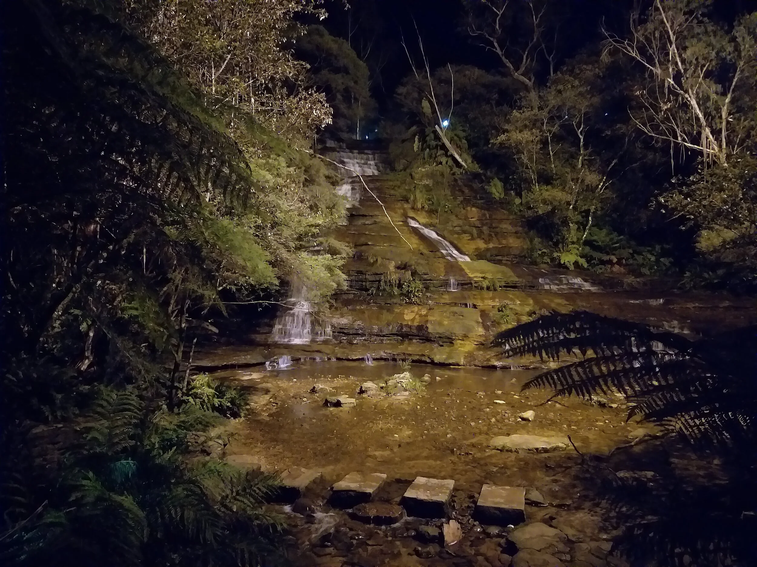 Illuminated night walk through the Katoomba Falls — Makayla Muscat