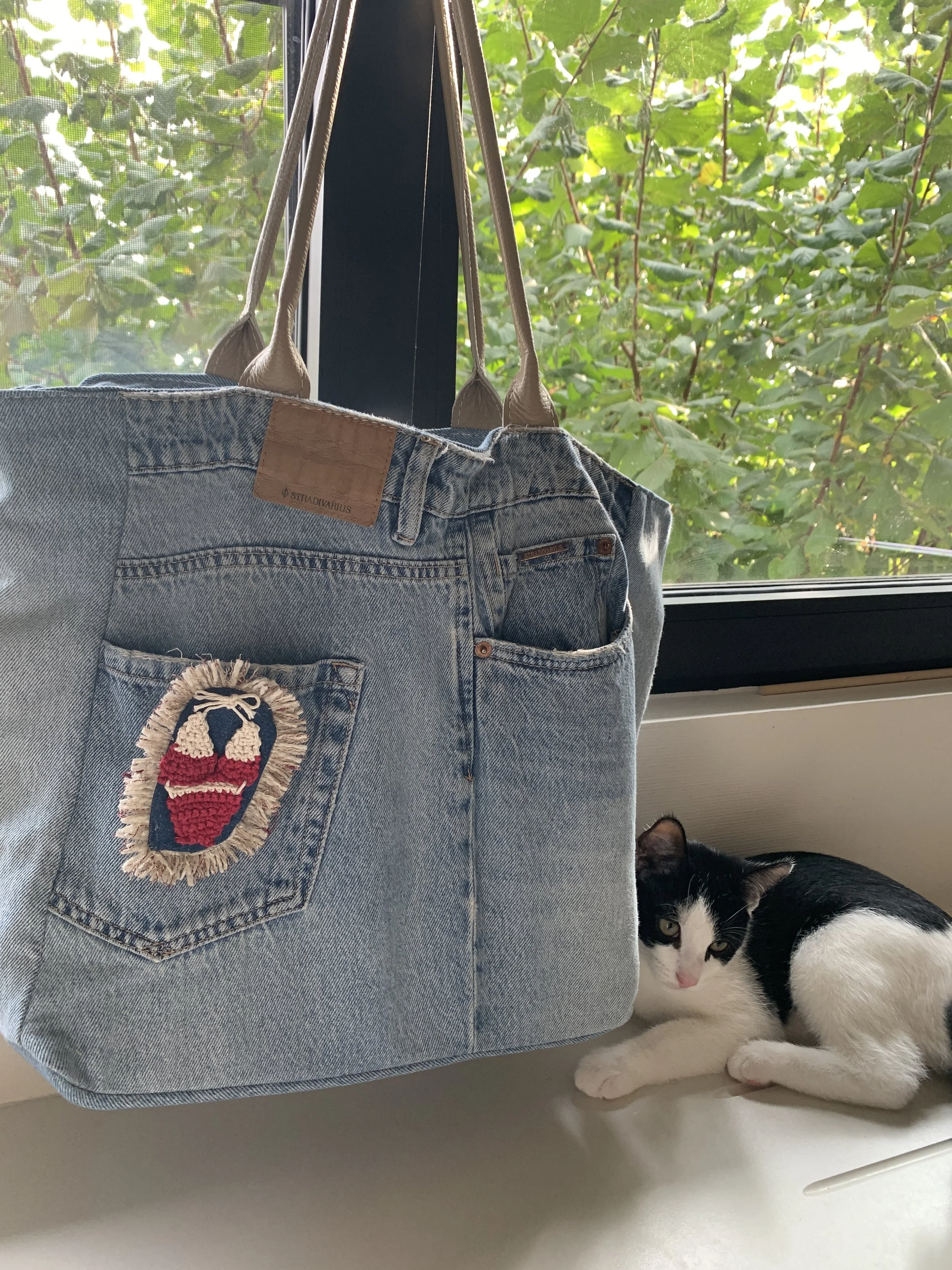 Mini- haakwerkje. Applicatie voor jeanstas