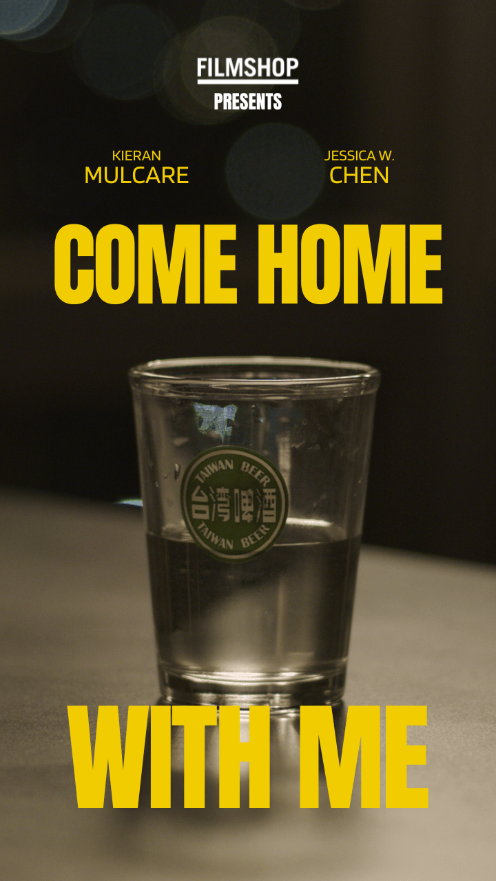 A close-up of a glass of water with a sticker that says 'Taiwan Beer' on it. The background is dark with some blurred lights. Overlaid text reads: 'Filmshop Presents Kieran Mulcare Jessica W. Chen Come Home With Me'.