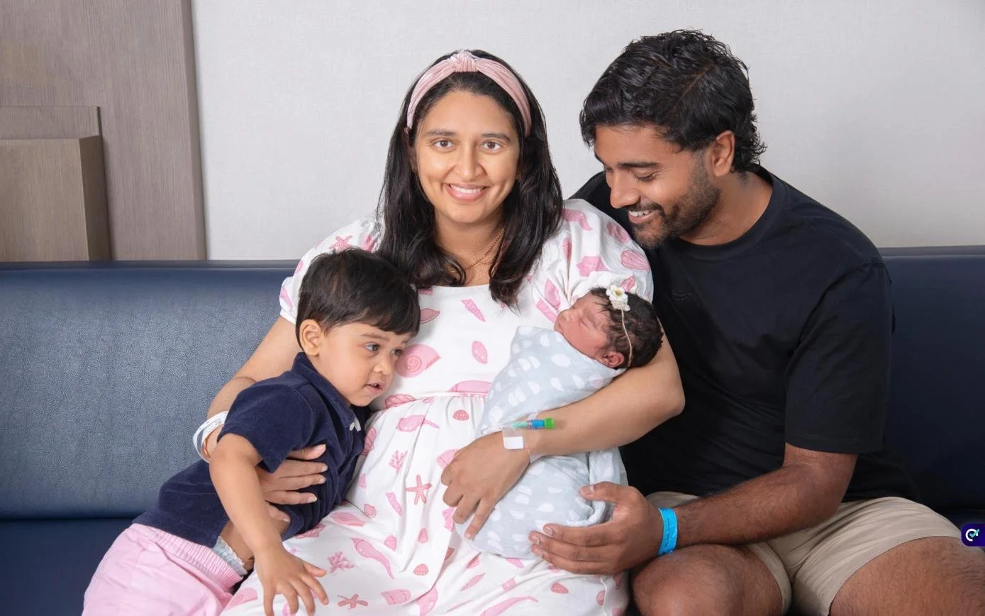 Family with their newborn and toddler during a Fresh48 hospital photo session at Overlook Medical Center, Summit NJ