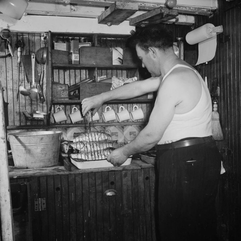   Coppola prepares a meal for the crew  