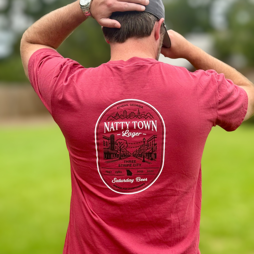 Man wearing Peach Jack Apparel Natty Town Lager Comfort Colors pocket tee inspired by college football Saturdays in Athens, Georgia.