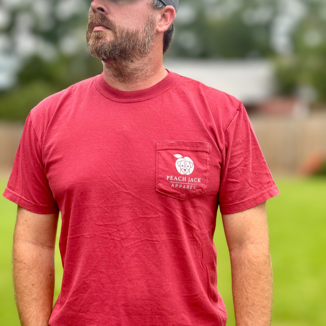 Man wearing Peach Jack Apparel Natty Town Lager Comfort Colors pocket tee inspired by college football Saturdays in Athens, Georgia. This image shows the front view close up.