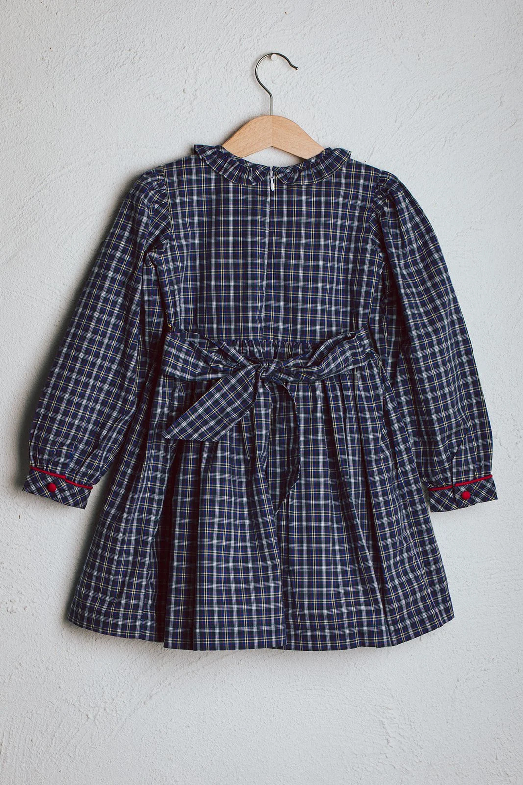 Australian brand Dot and Mila long sleeved check smocked dress for baby or toddler or girl.