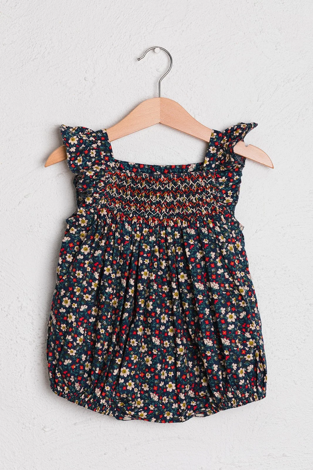 handsmocked-navy-floral-liberty-print-girls-romper-baby-toddler.jpg