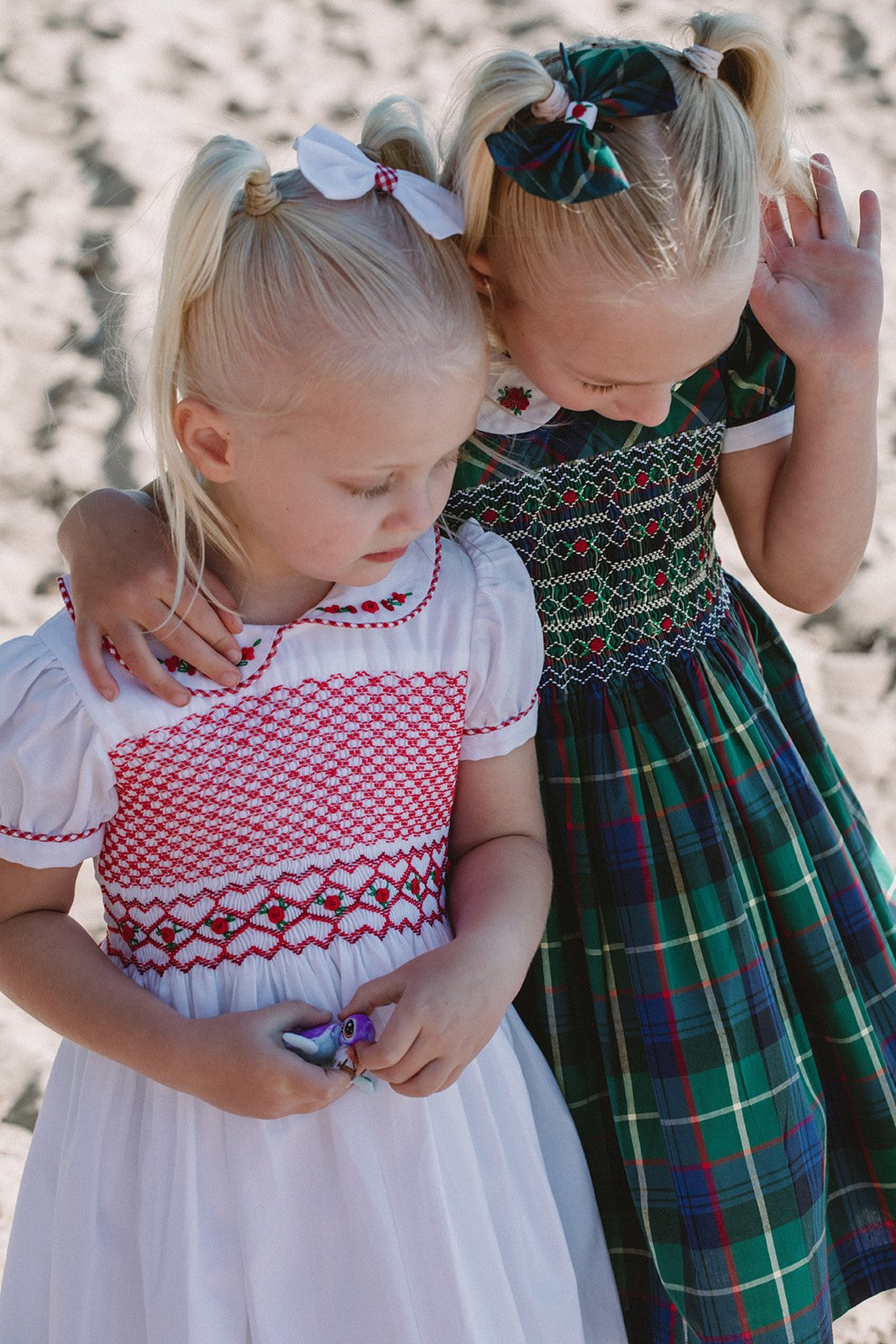 girls-sisters-handmade-smocked-dresses.jpg