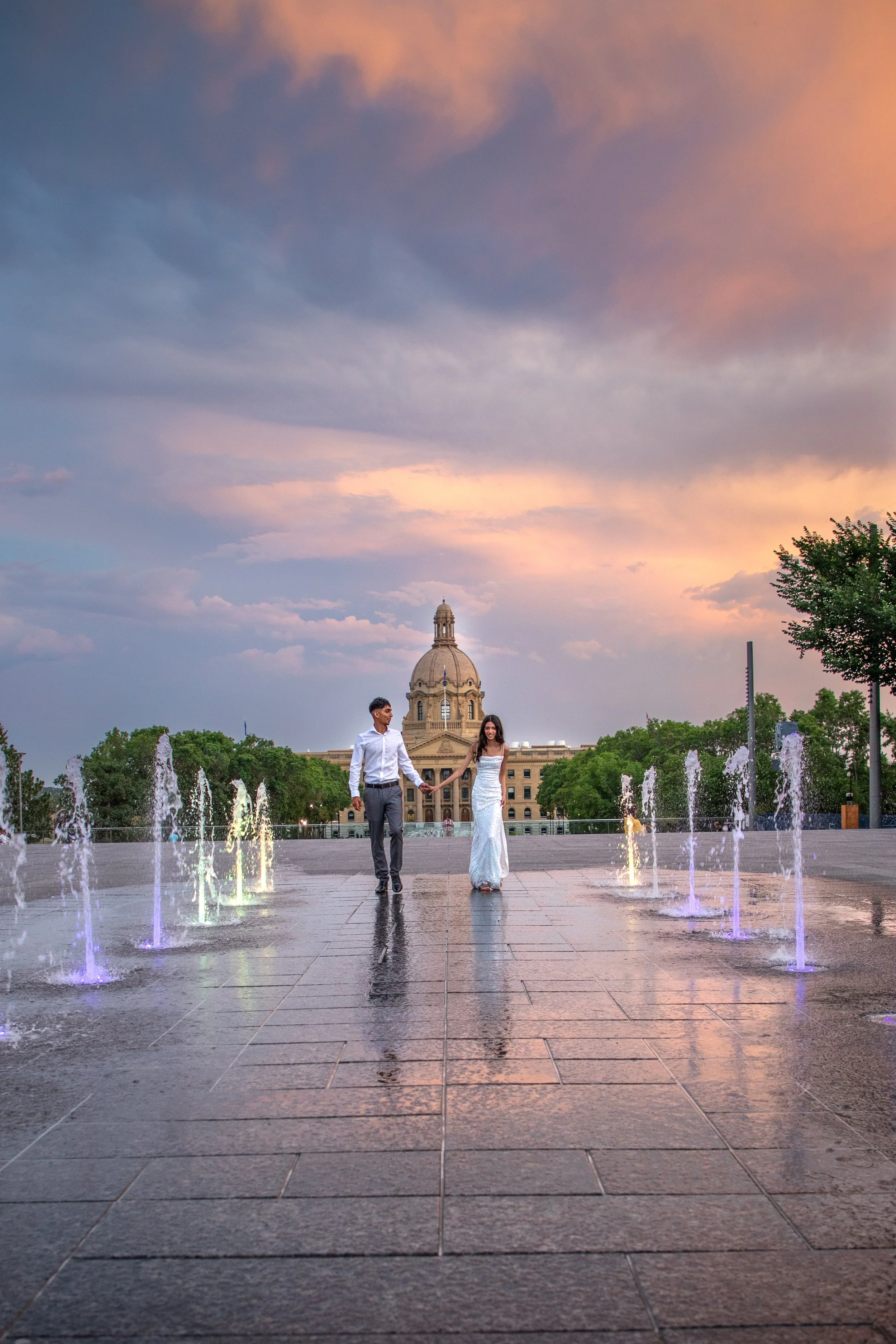 Romantic couples photo at sunset with colourful sky in Edmonton Alberta