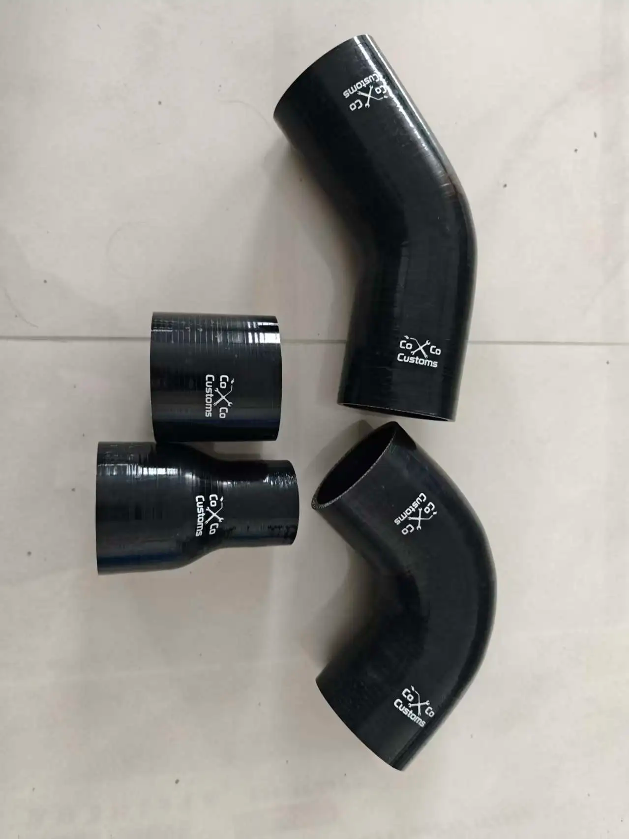 3"  couplers- 90 , 45 , or straight degree elbow silicone coupler
