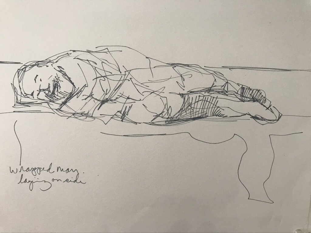'Wrapped man laying on side" Pen 11 1/2" x 8" 2021