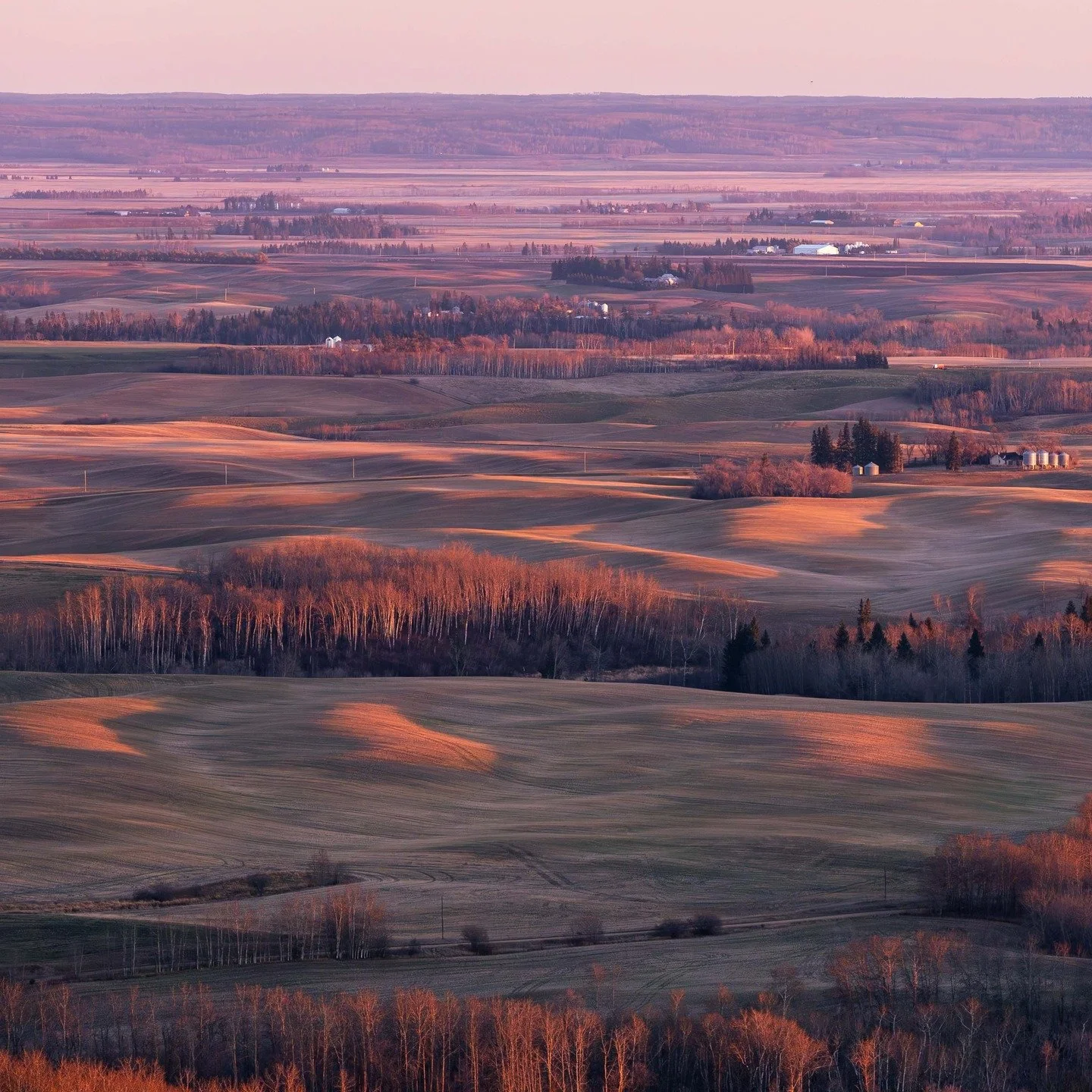 Sunset looking out from Thunder Hill near Swan River, MB. I got this panorama from the top of one of the lifts.