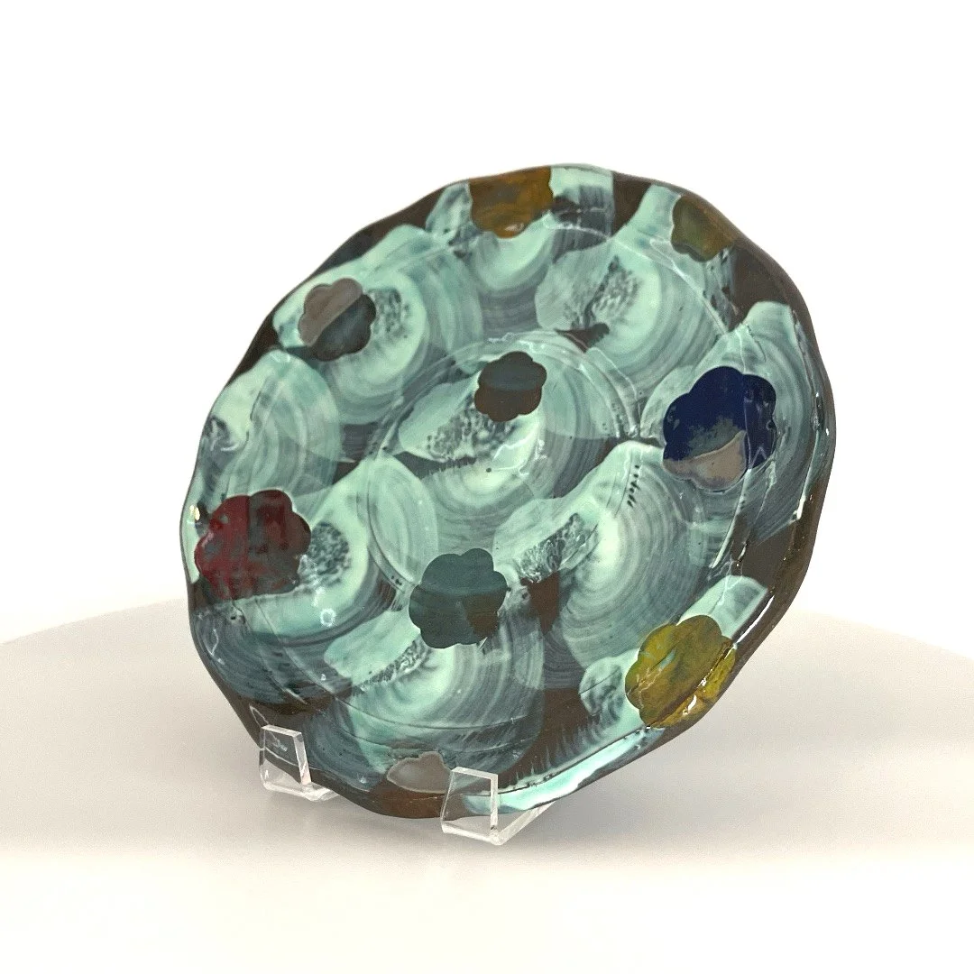 Sanam Emami: Dinner plate with floating patterns