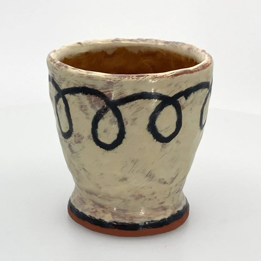 Holly Walker: Cursive cup- black and white, amber interior